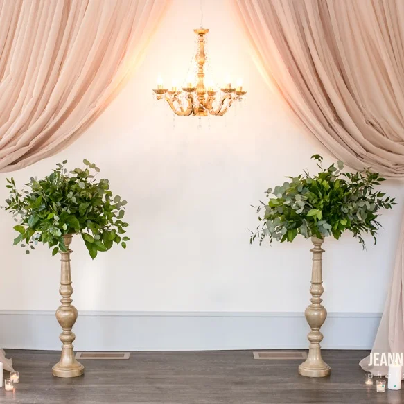 gold chandelier with a backdrop for weddings