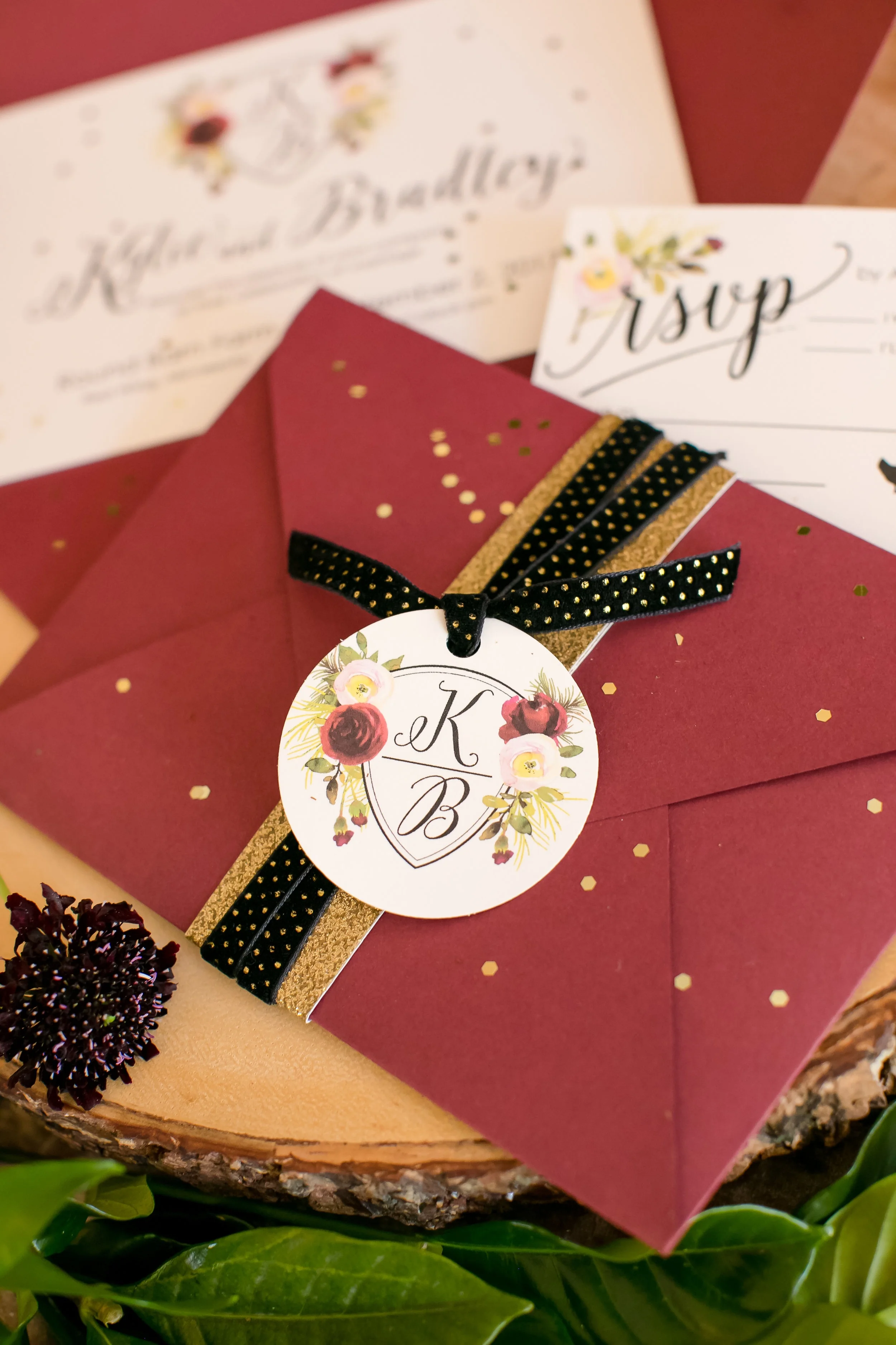 Burgundy envelope with gold accents for simple stationary that everyone will love
