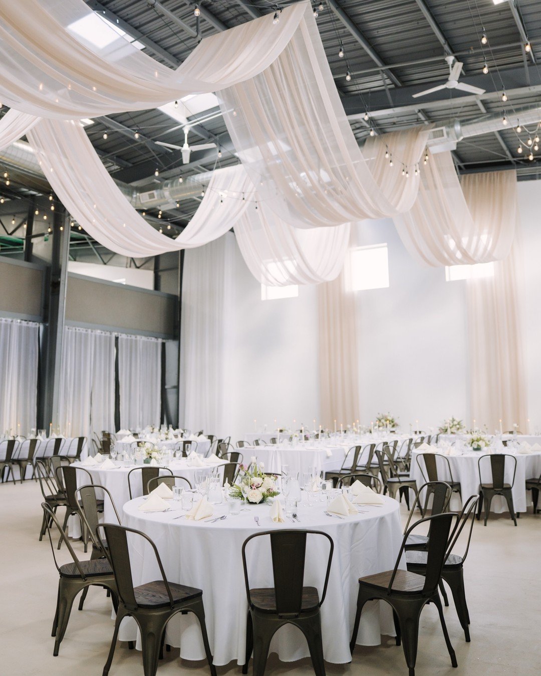 We asked the fabric to create a sanctuary. It delivered a masterpiece.

#weddinginspiration  #mnweddingdecor #twincitiesbride #minneapolis #minnesota #minneapolisevents #wedding #twincitieswedding #rattanlights #weddinglighting #weddingplanning #mnev