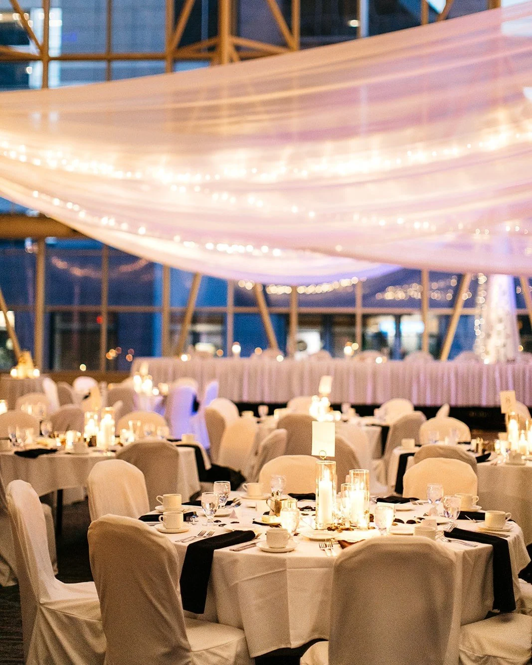 The drapes are here to ensure that when guests look up, they see magic, not mundane.

#weddinginspiration  #mnweddingdecor #twincitiesbride #minneapolis #minnesota #minneapolisevents #wedding #twincitieswedding #weddingplanning #mnevents #minnesotawe