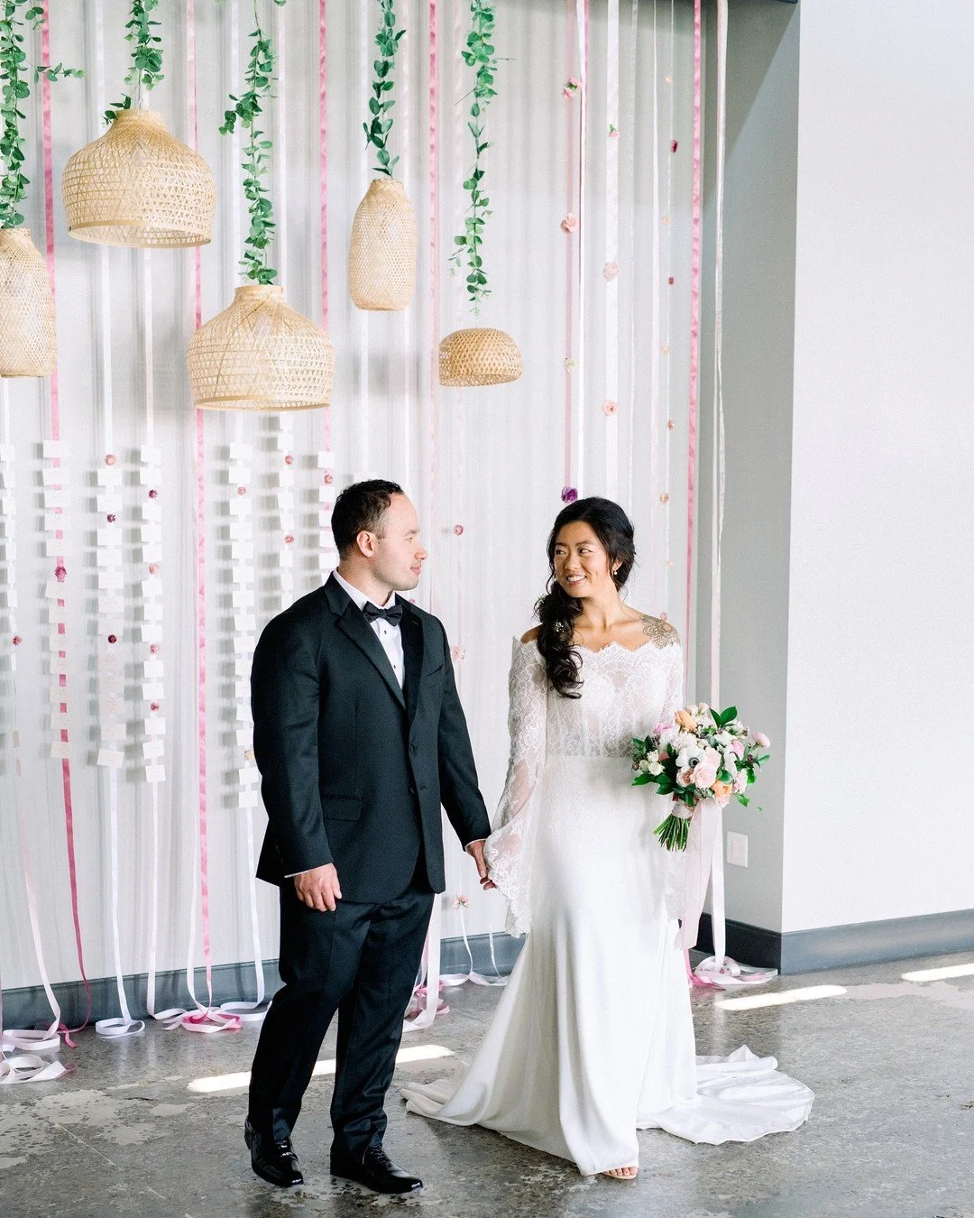 Woven with love and lit with intention. Our ratton chandeliers can create a backdrop for stunning photos or dangle over your head table to add soft, glowing ambiance. 

Lighting &amp; Linen: @wevegotcovered
Floral: @studiobfloral
Stationery Installat