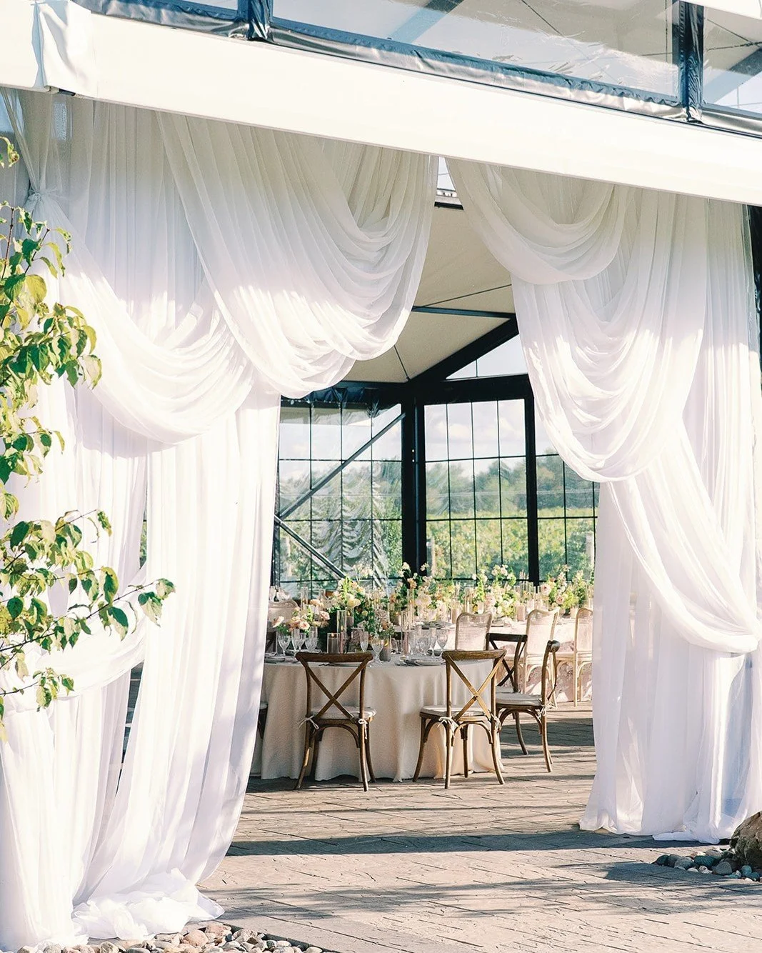 Give your guests a "wow" moment before they even walk through the doors.

#MNWedding #TwinCitiesWeddings #WeddingDraping
#CeilingDraping #StPaulWedding #rusticrootswinery