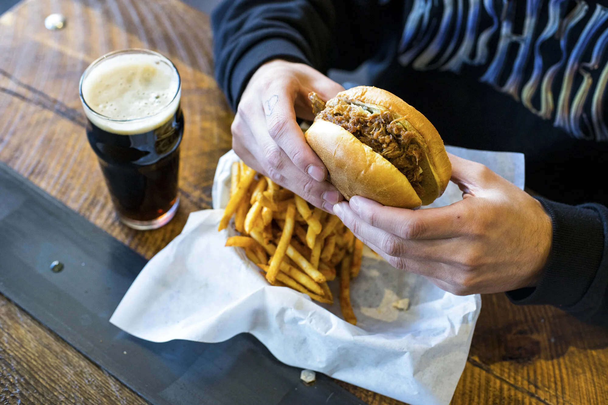 Nick Holding Pulled Pork.jpg