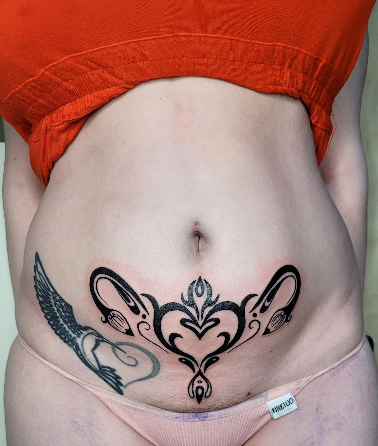 ཐི❤︎ཋྀ  Cramp Stamp for Gwen ཐི❤︎ཋྀ 
Designed by my client, tweaked a bit by me! 
Hit me up for a Cramp Stamp™️... this is my calling
Made at @blackcat.tattoo 
.
.
.
#crampstamp #bellytattoo #tummytattoo #uterustattoo #y2ktattoo #queertattooe