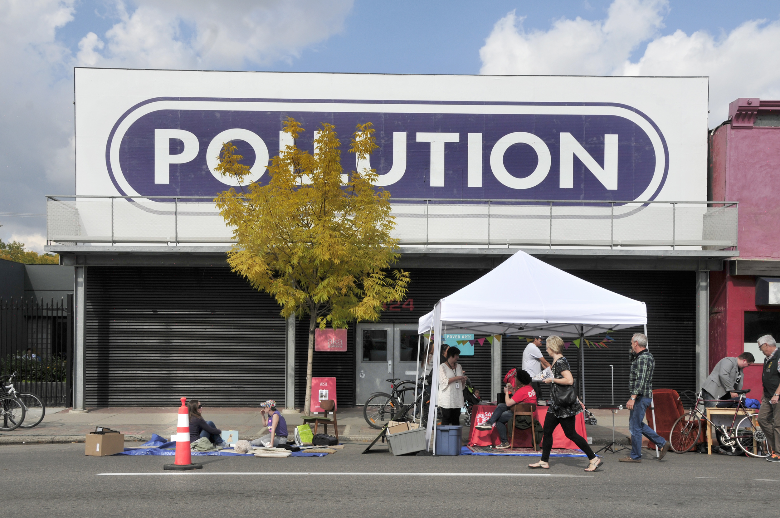 Activity in front of AKA & PAVED Arts on 20th Street.