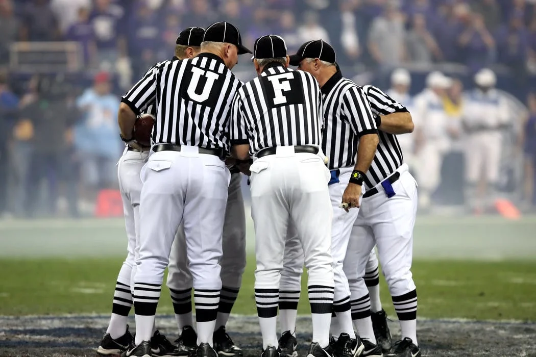 american-football-american-football-officials-referees-referee-163528.jpeg