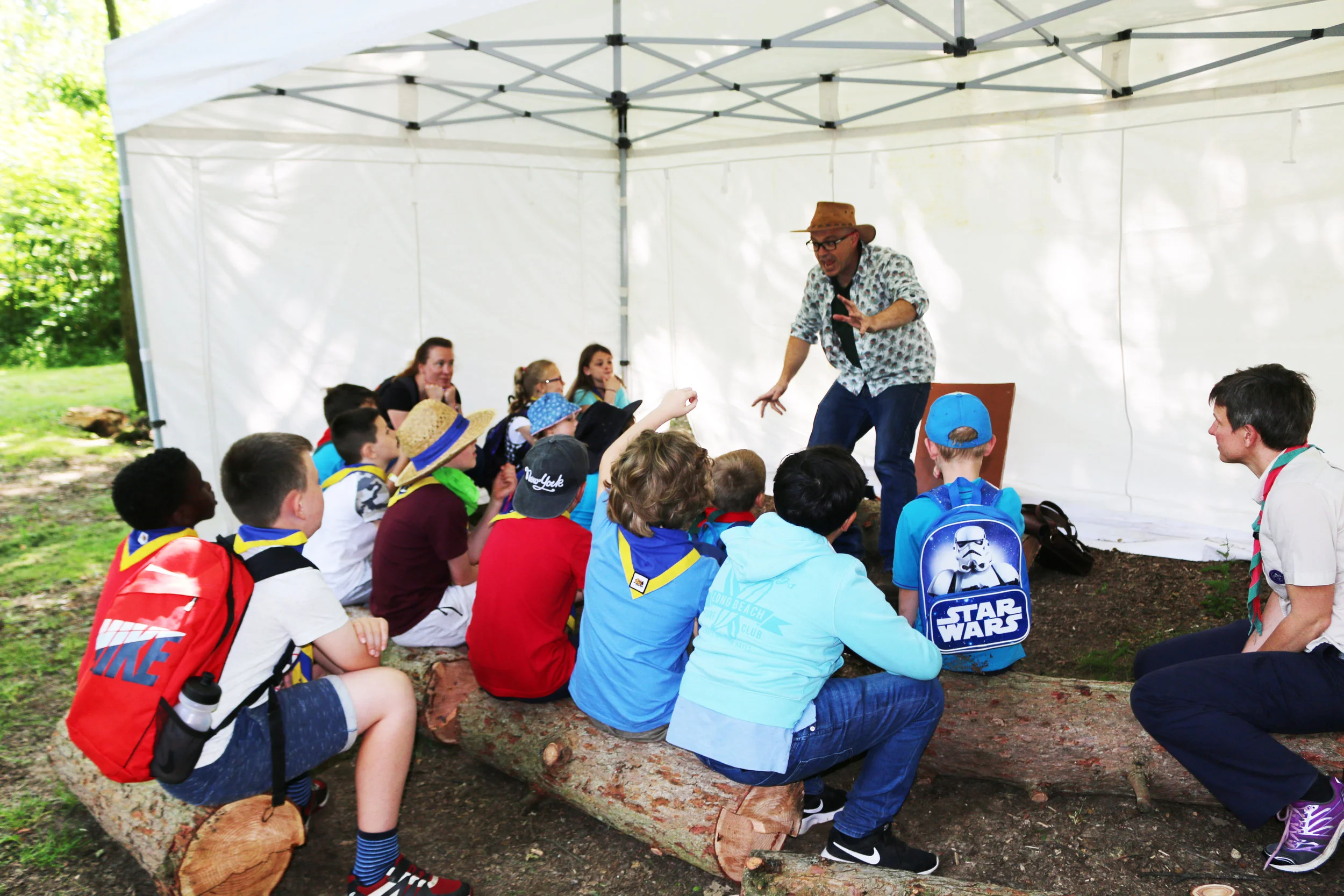 Outdoor storytelling at Frylands Wood Scout Activity Centre.