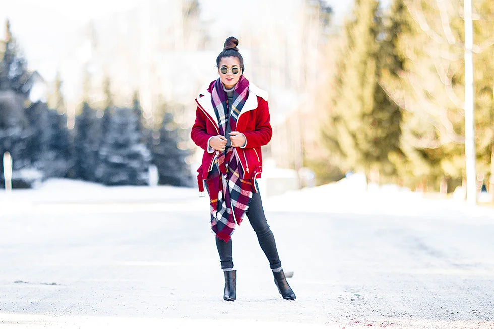 Festive Red Winter Outfit featuring Shearling Jacket and plaid scarf in Whistler Canada