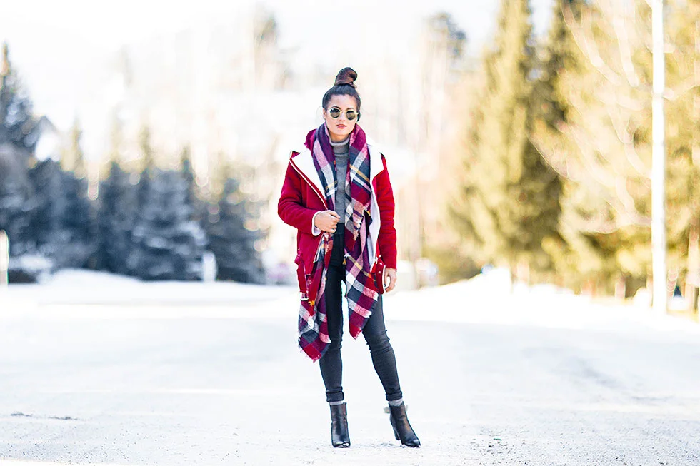 Festive Red Winter Outfit featuring Shearling Jacket and plaid scarf in Whistler Canada