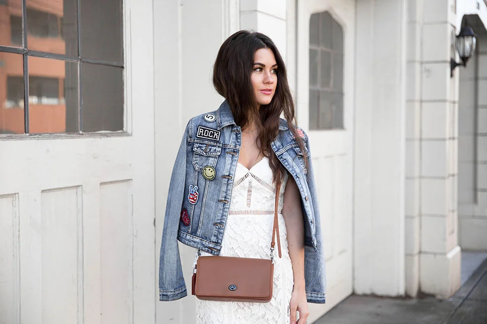 Update Your Classic Denim Jacket this April - Cropped Patchwork Denim Jacket, Lace Midi Dress, Coach Dinky Crossbody in Glovetanned Leather Spring Outfit