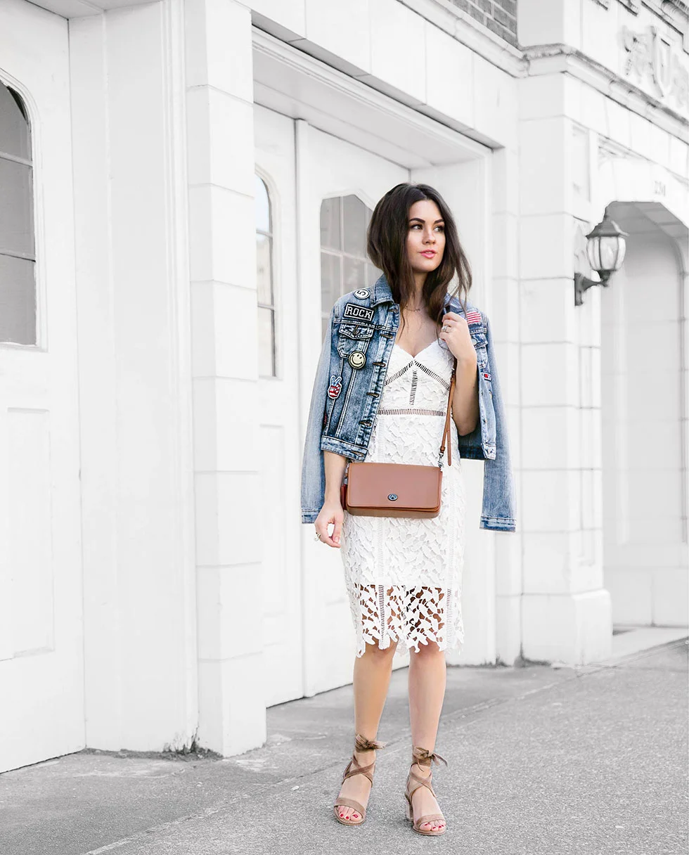 Update Your Classic Denim Jacket this April - Cropped Patchwork Denim Jacket, Lace Midi Dress, Coach Dinky Crossbody in Glovetanned Leather, Chinese Laundry Wraparound Ankle Strap Sandal Spring Outfit