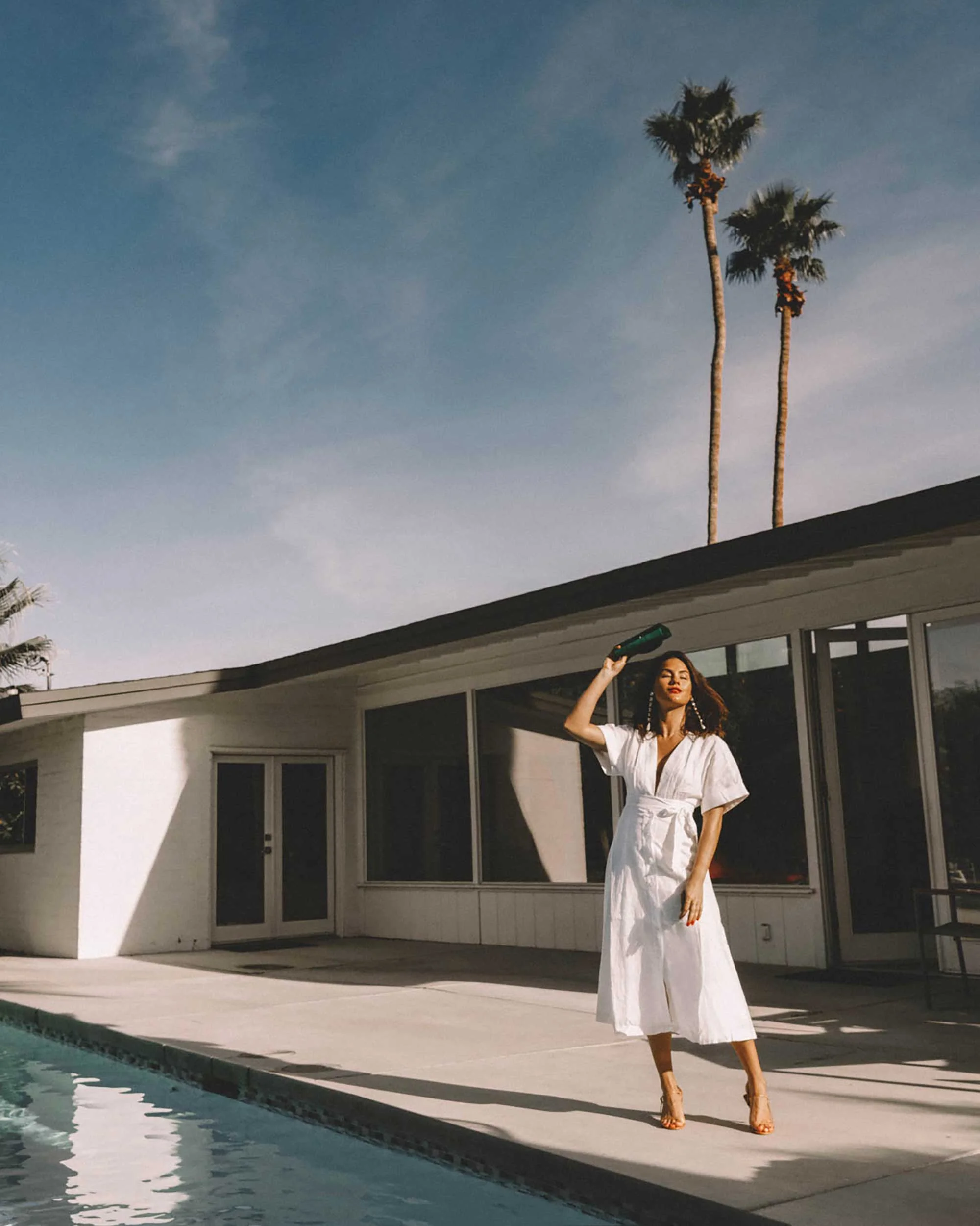 Sarah Butler of Sarah Styles Seattle wears Nauman Linen Dress in Bright White and Ferragamo Mini Gancini Top Handle Wallet in Palm Springs Outfit | @sarahchristine -8.jpg