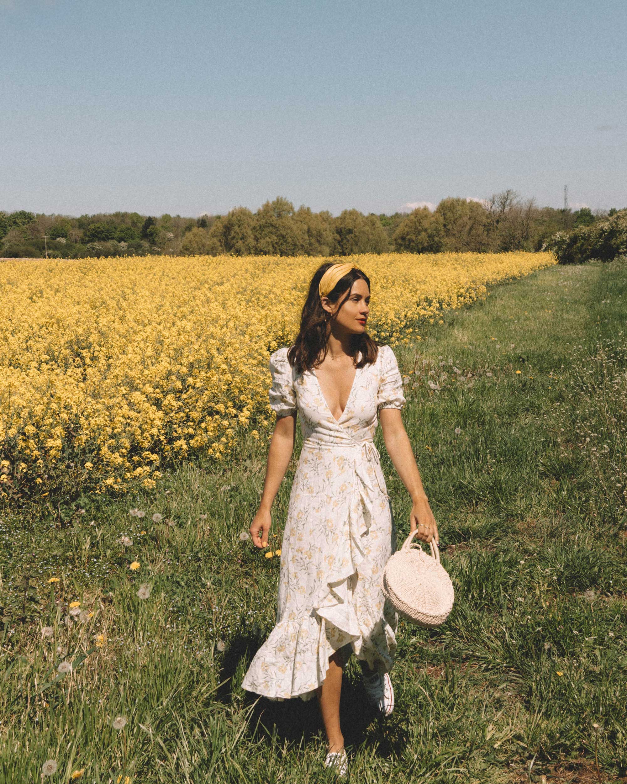 Sarah Butler of Sarah Styles Seattle wears And Other Stories Ruffled Linen Wrap Midi Dress and round woven bag in England Countryside for the perfect floral summer dress | @sarahchristine 18.jpg