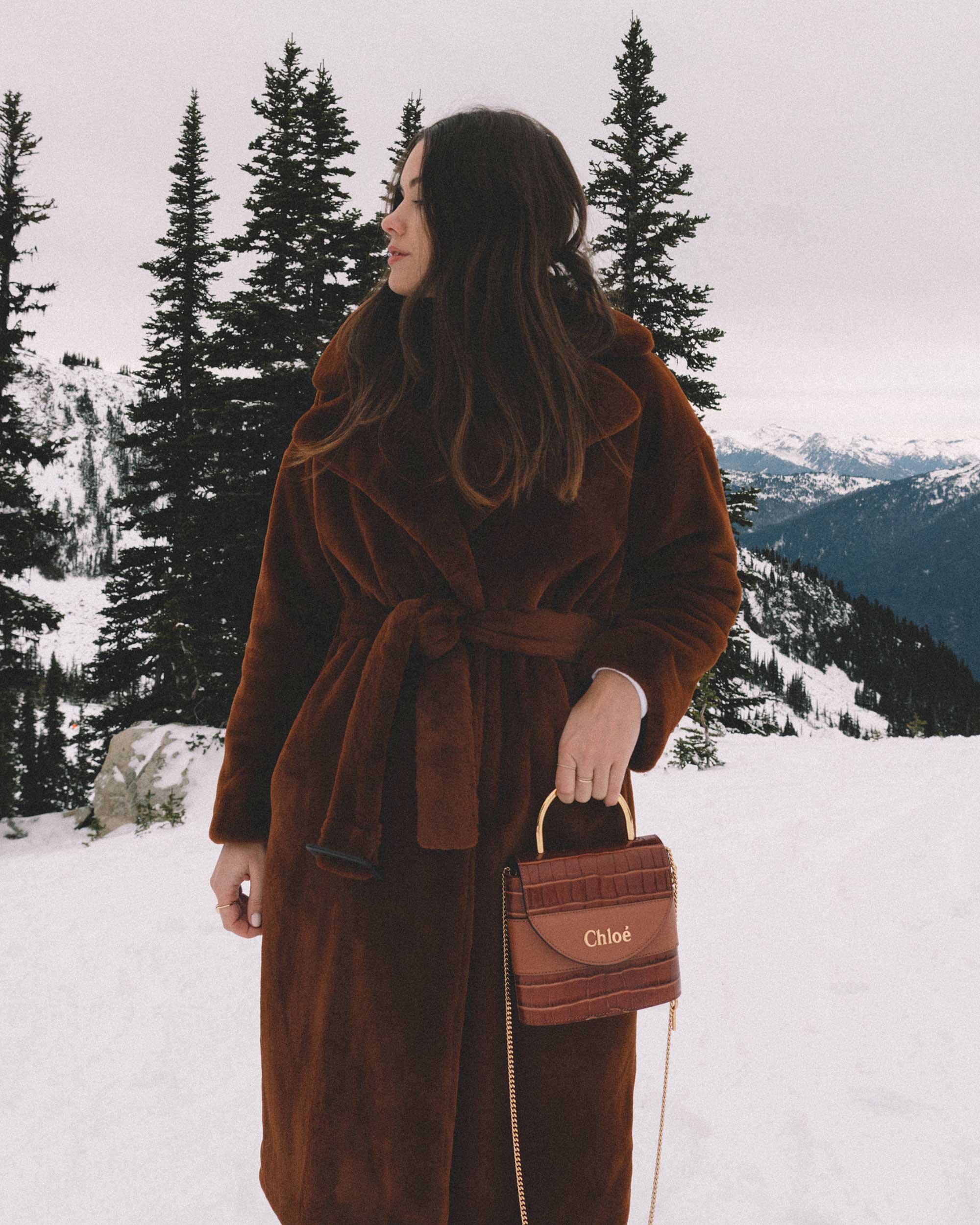 Easy Winter Outfit Ideas. Sarah Butler of @sarahchristine wearing Brown Belted Faux Fur Long Coat in Whistler, Canada -1.jpg