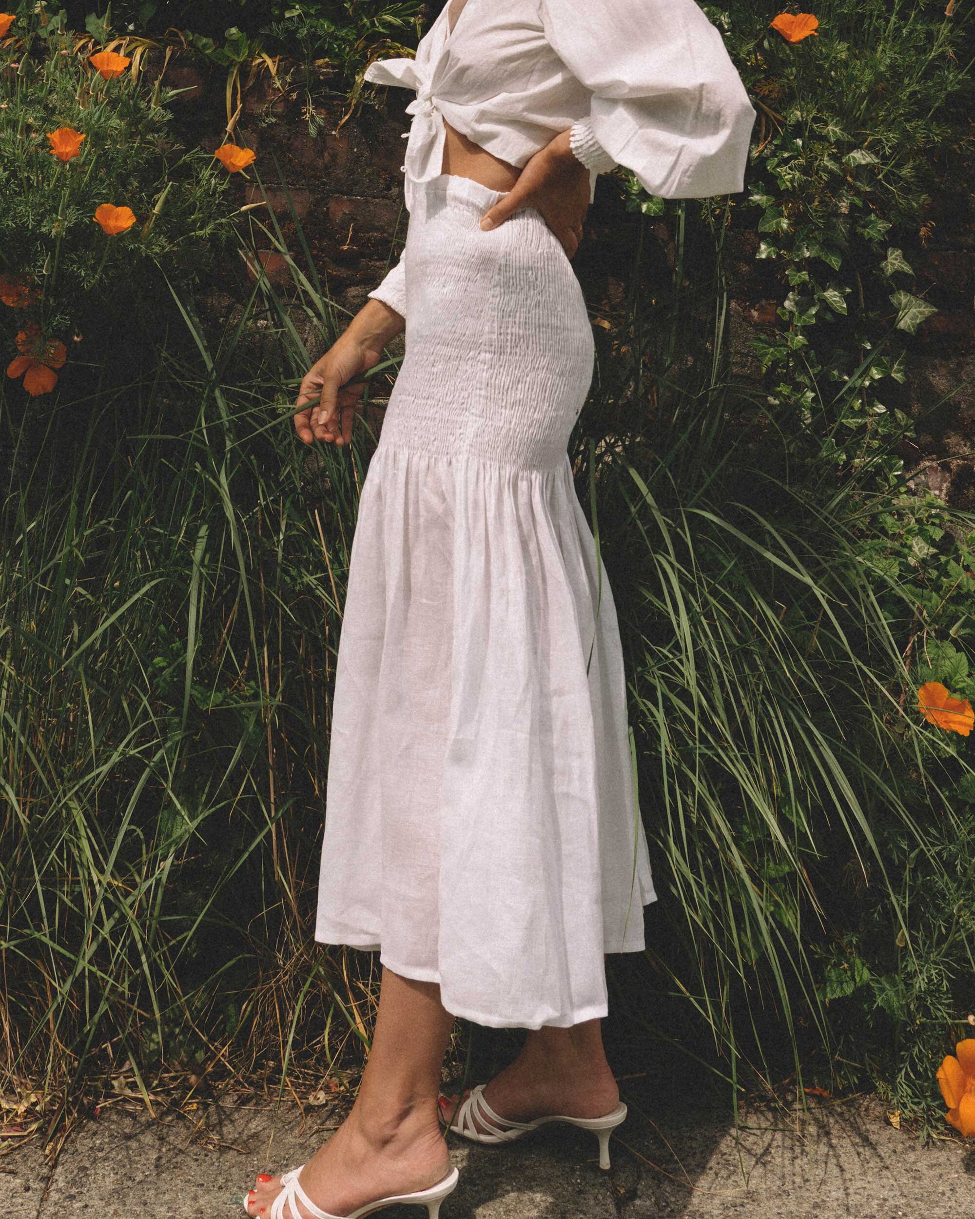 Easy Spring Outfit Ideas. Sarah Butler of @sarahchristine wearing Solid & Striped Smocked Midi Skirt and Tie Front Poplin Blouse in Seattle, Washington -8.jpg