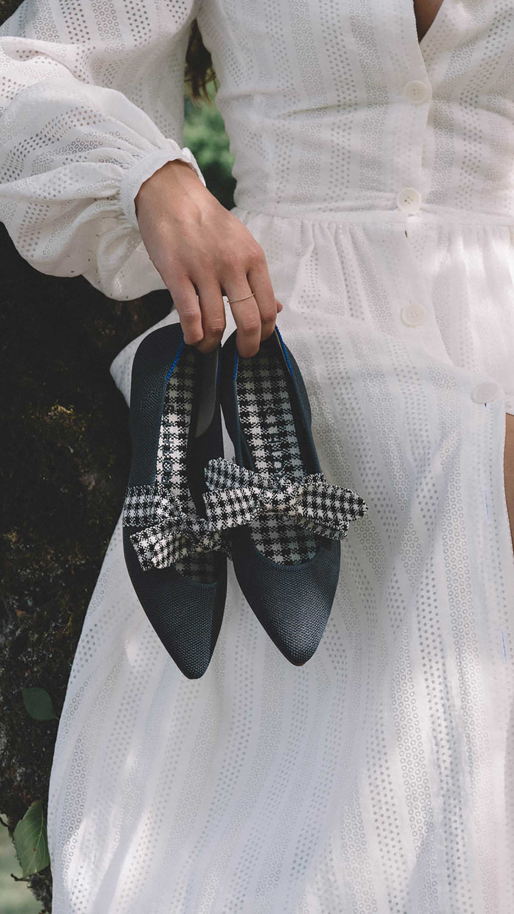 Sustainable clothing brands to support. Sarah Butler of @sarahchristine wearing Rothy’s The Mary Jane in Ink Gingham with black and white gingham bows in Seattle, Washington -2.jpg