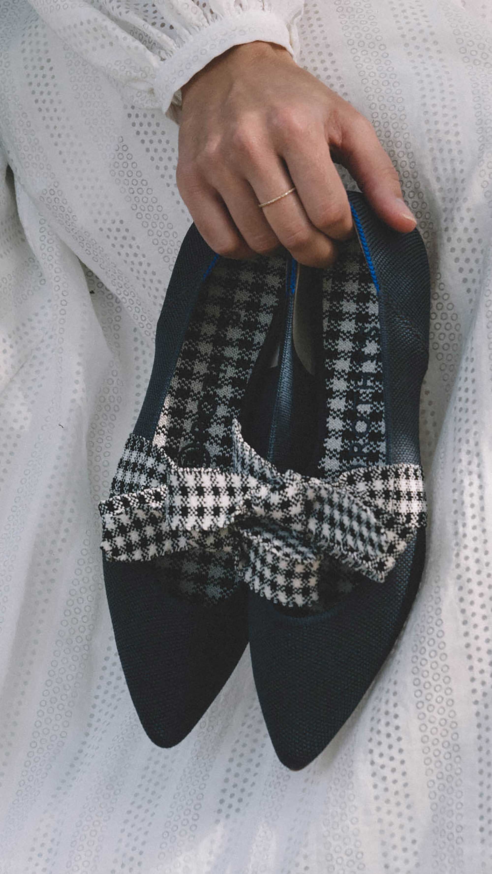 Sustainable clothing brands to support. Sarah Butler of @sarahchristine wearing Rothy’s The Mary Jane in Ink Gingham with black and white gingham bows in Seattle, Washington -1.jpg