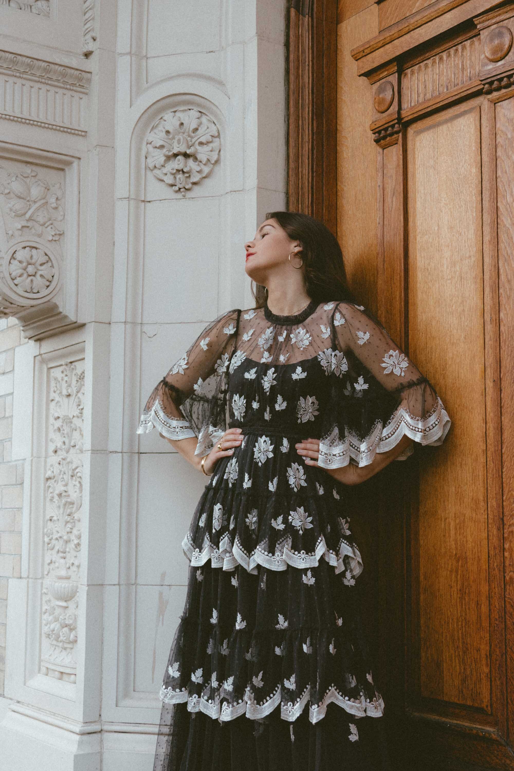 Chic vintage victorian inspired holiday dress. Sarah Butler of @sarahchristine wearing Needle and Thread Amber Petal Gown in Graphite made from sequin-embellished tulle with tiered ruffled trims and a semi-sheer fabrication in Seattle, Washington -8.jpg