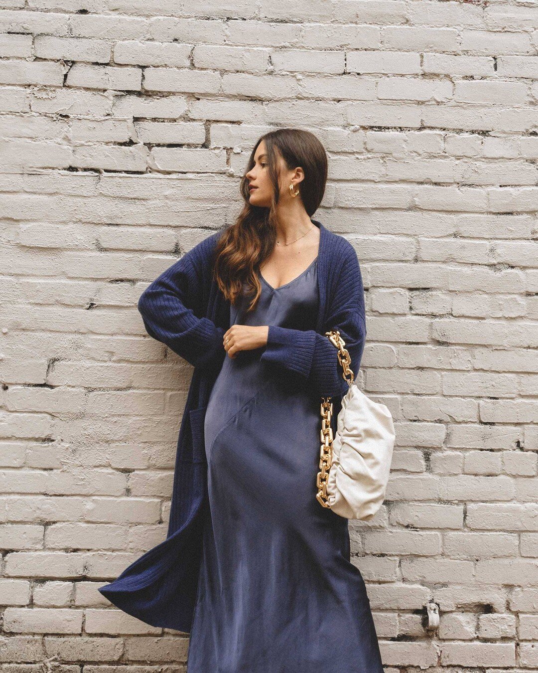 Favorite winter textures: silk and cashmere 💙 I love wearing dresses - so much so that I don&rsquo;t want to give them up just because the temperature drops. A satin dress and long cashmere sweater is one of my favorite ways to wear a dress during w