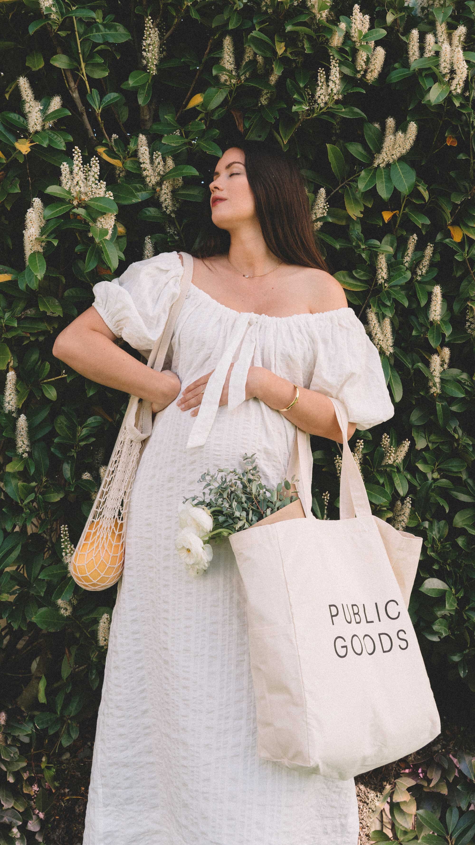 Spring Maternity Outfit Idea: white off the shoulder midi dress. Sarah Butler of @sarahchristine wearing Free People off the shoulder puff sleeve scoop neck midi dress - 5.jpg