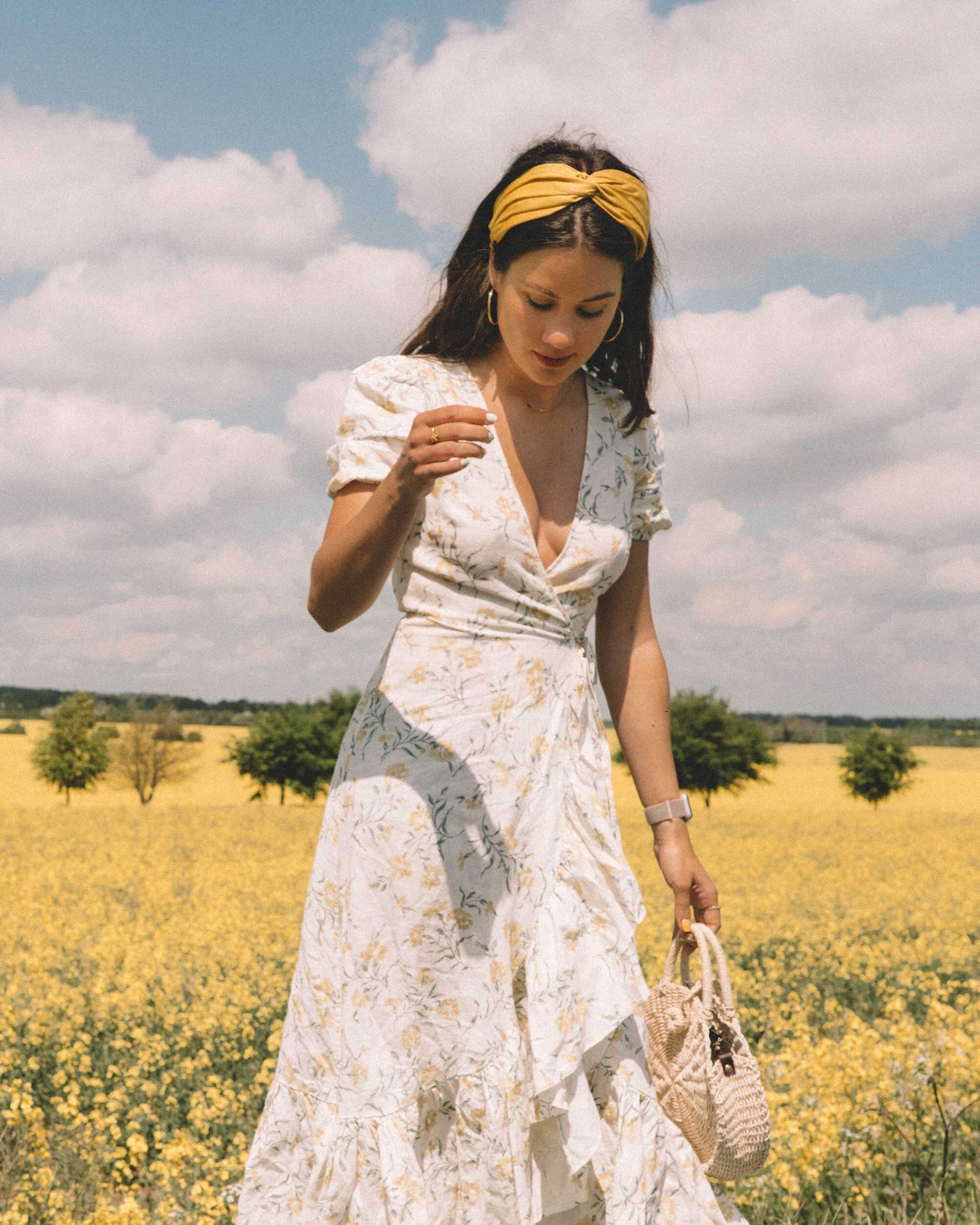 Sarah+Butler+of+Sarah+Styles+Seattle+wears+And+Other+Stories+Ruffled+Linen+Wrap+Midi+Dress+and+round+woven+bag+in+England+Countryside+for+the+perfect+floral+summer+dress+|+@sarahchristine+14.jpg