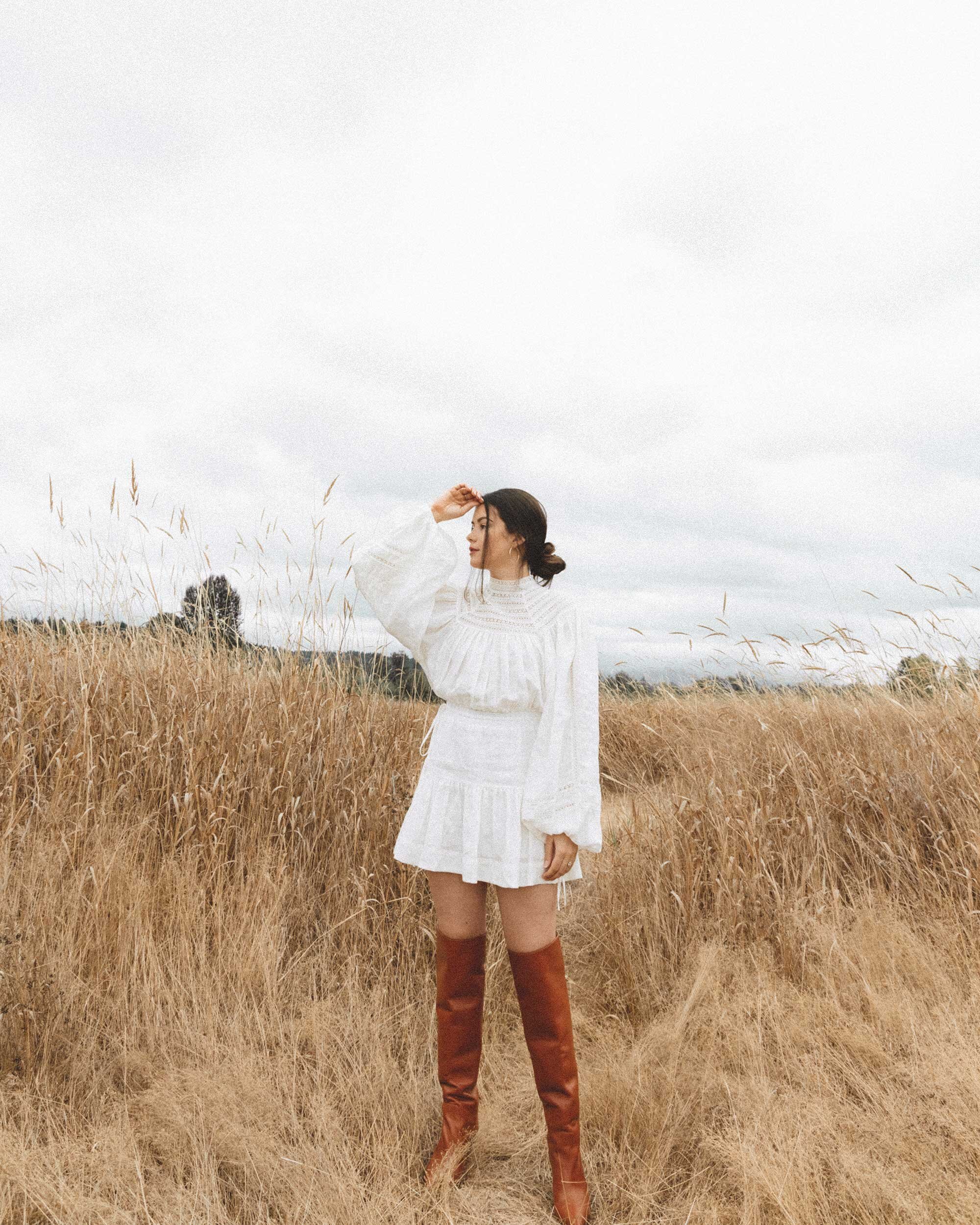Early Fall Boot Outfit Idea. Sarah Butler of @sarahchristine wearing Shona Joy Lola high neck balloon sleeve min dress with Stuart Weitzman over the knee leather boots in countryside field of Seattle, Washington - 12.jpg