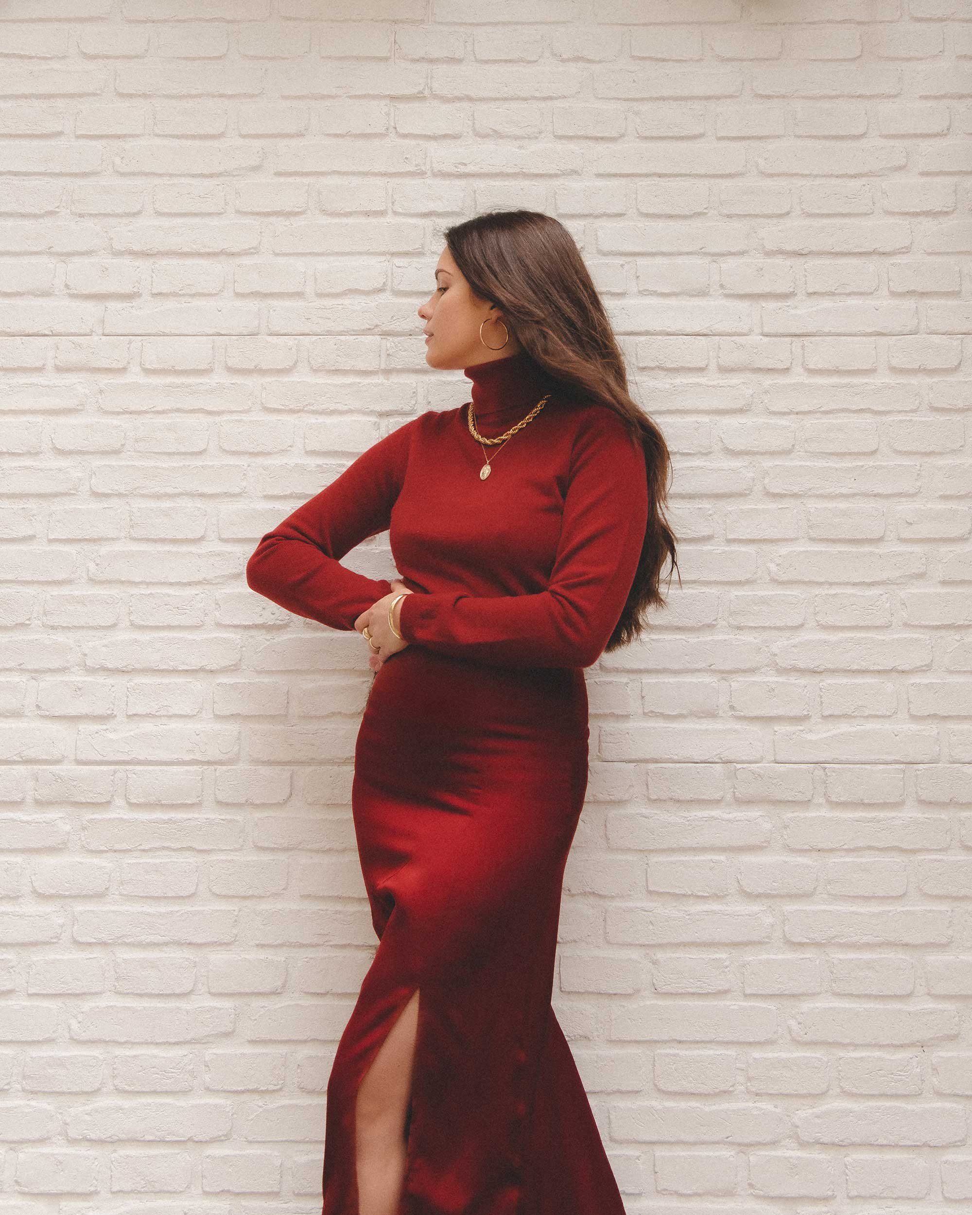 Holiday Party Outfit Idea. Sarah Butler of @sarahchristine wearing Falconeri Ultrasoft Red Cashmere Turtleneck Sweater and red satin skirt - 1.jpg