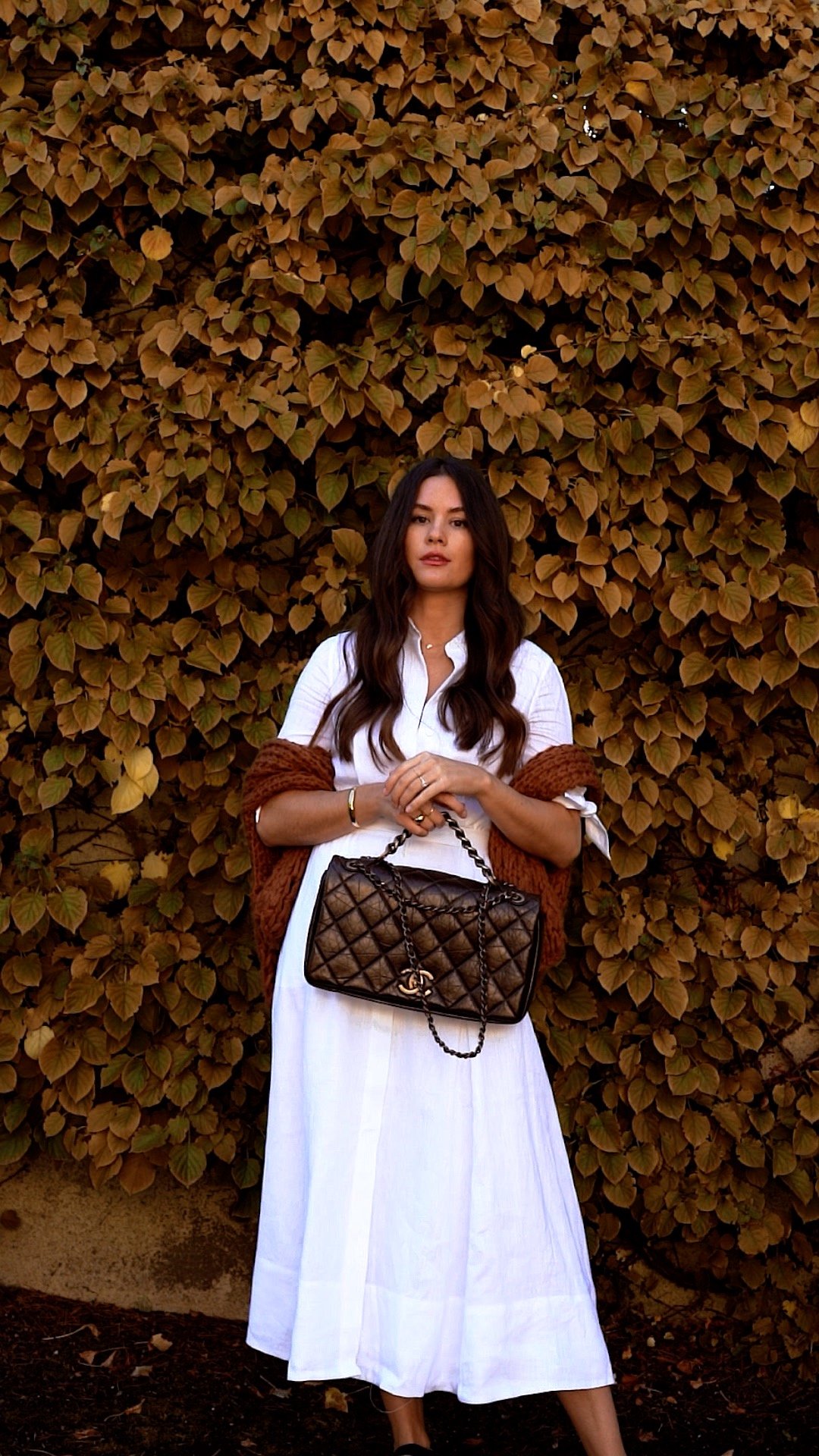 Parisian Style Fall Chic Outfits, Warm fall Outfits, Fall Brunch Outfit. @sarahchristine wearing white midi dress with brown sweater and Chanel bag outfit -3.jpg