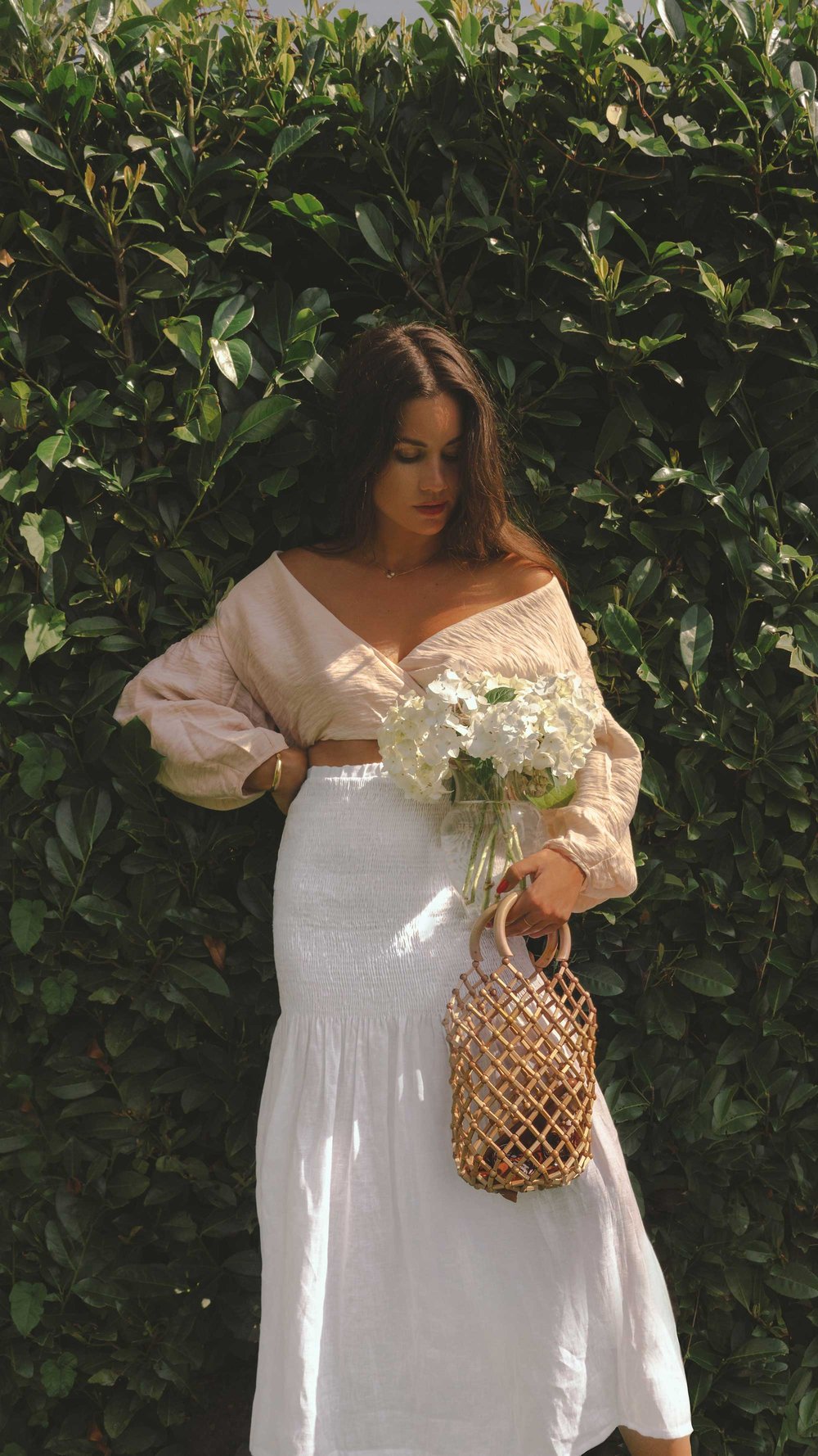 Easy Summer Outfit Idea. Sarah Butler of @sarahchristine wearing Wrap Crop Blouse and White Smocked Midi Skirt in Seattle, Washington - 24.jpg