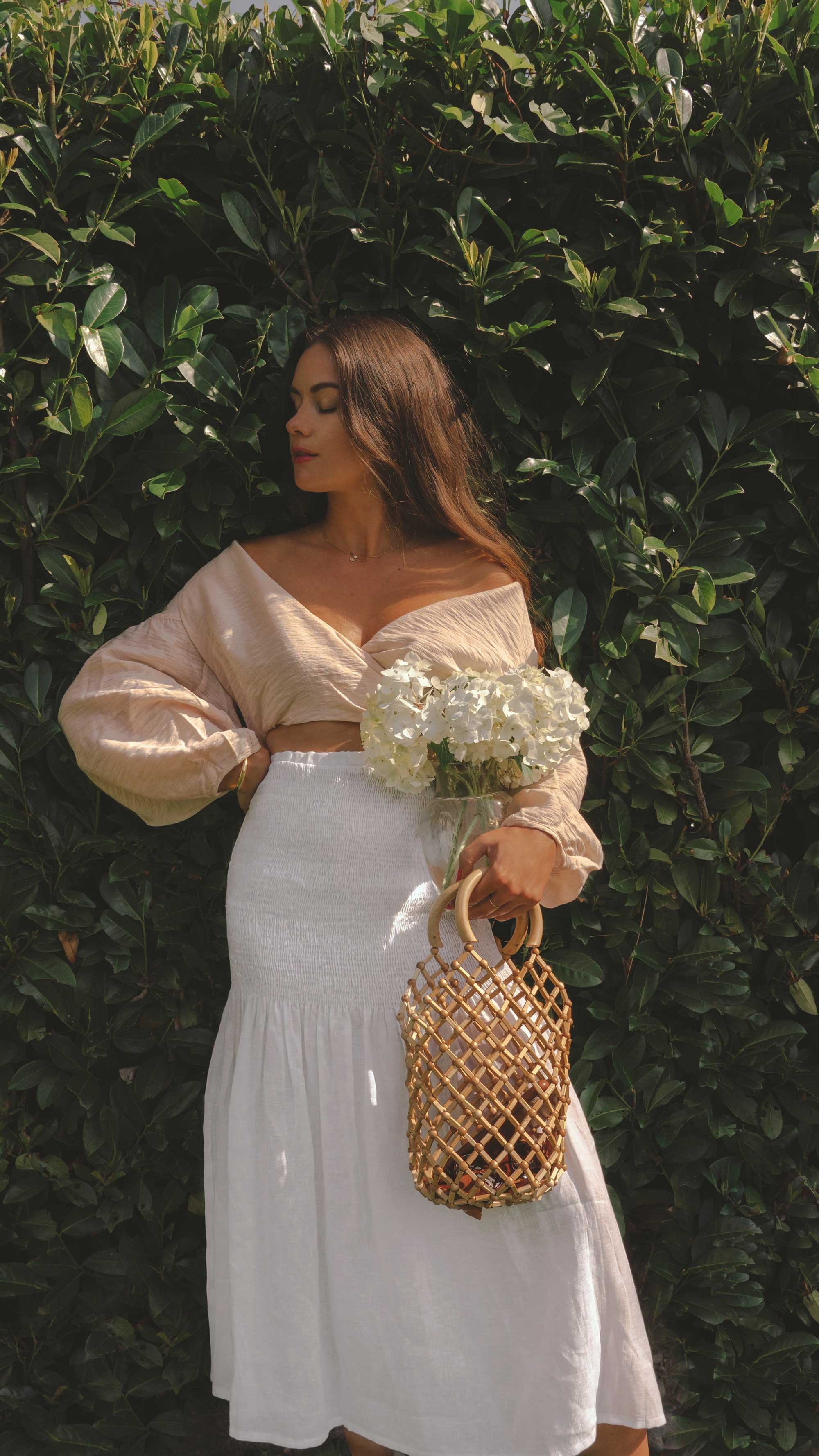 Easy Summer Outfit Idea. Sarah Butler of @sarahchristine wearing Wrap Crop Blouse and White Smocked Midi Skirt in Seattle, Washington - 23.jpg