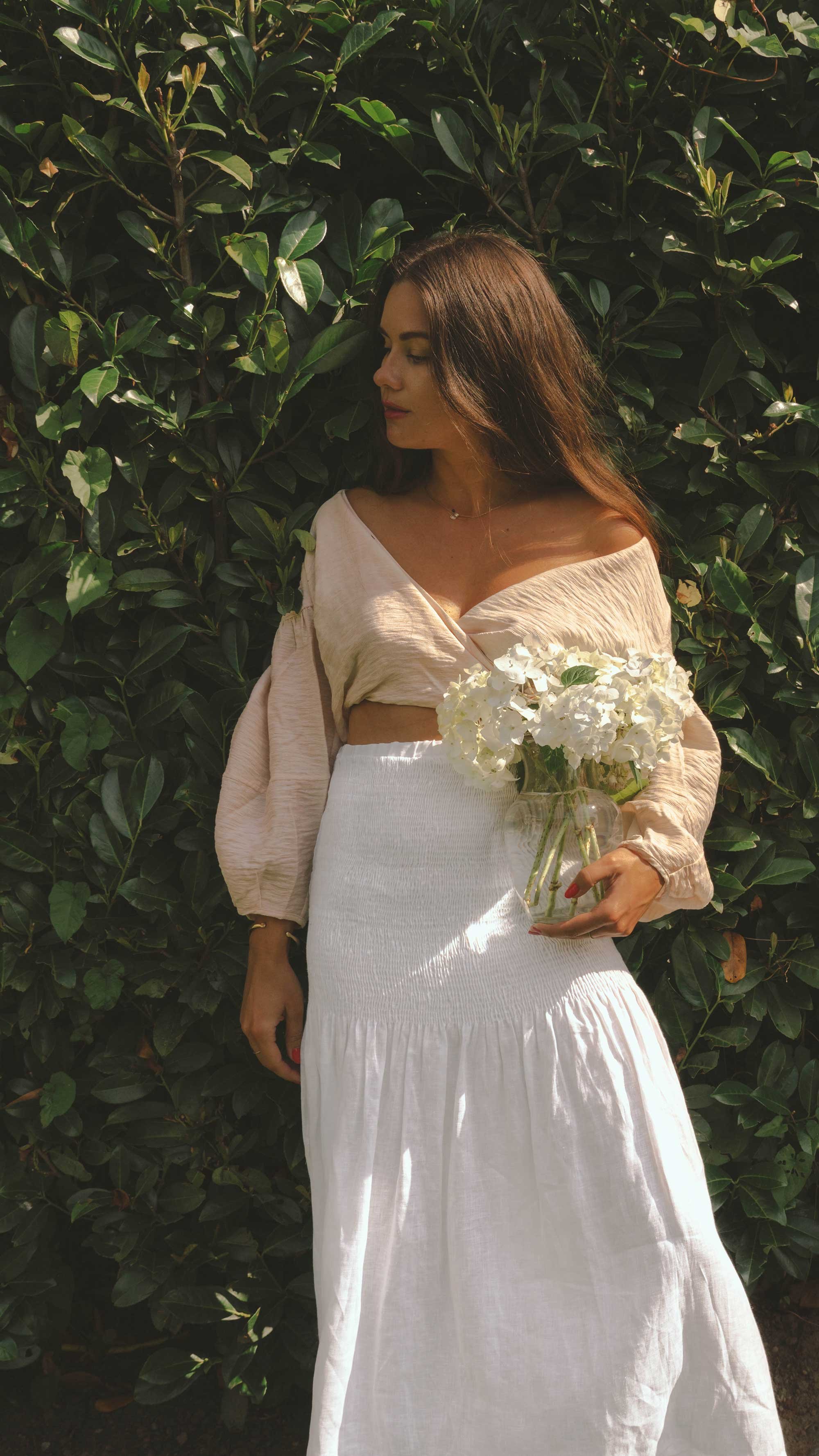 Easy Summer Outfit Idea. Sarah Butler of @sarahchristine wearing Wrap Crop Blouse and White Smocked Midi Skirt in Seattle, Washington - 21.jpg