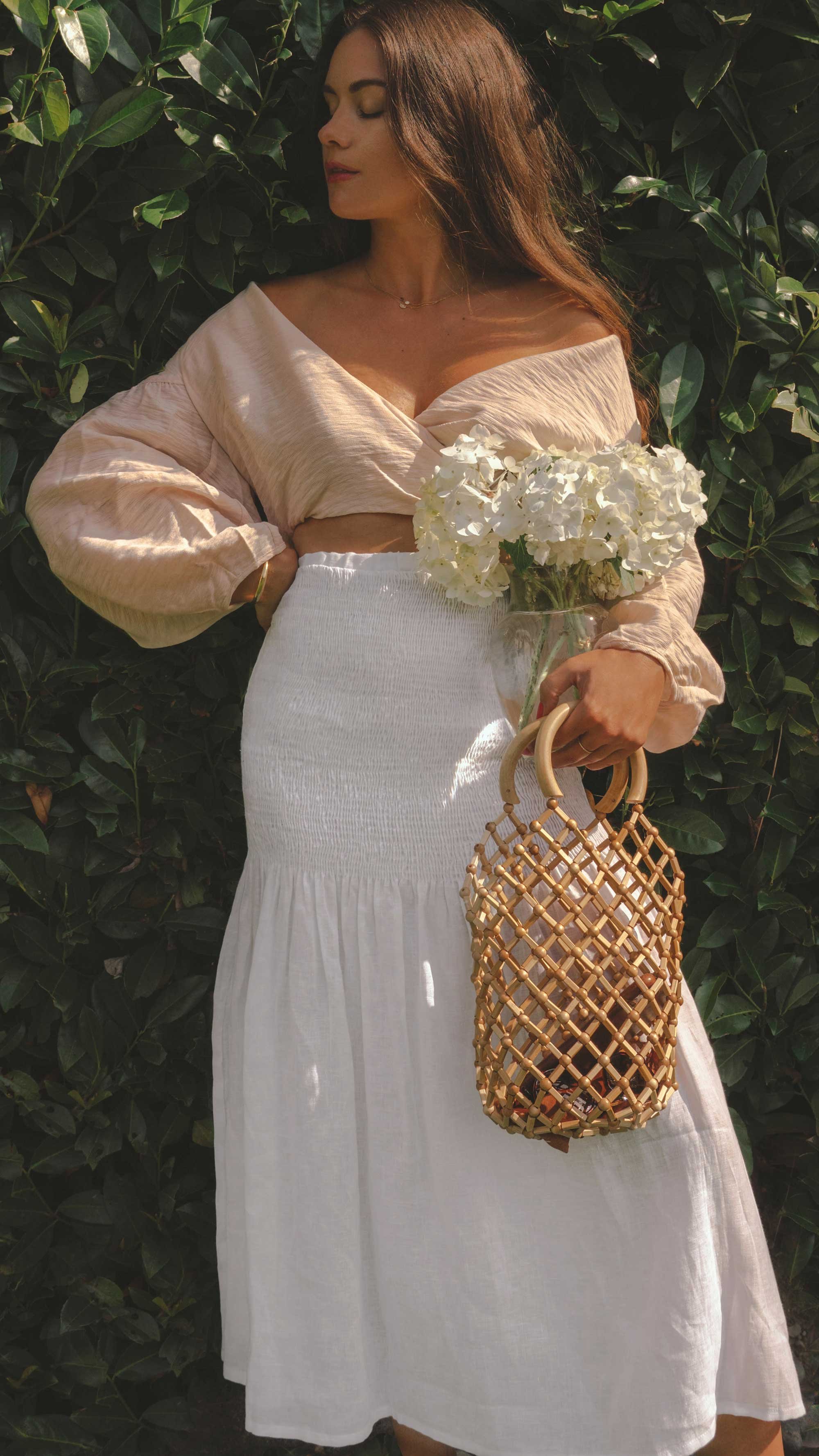 Easy Summer Outfit Idea. Sarah Butler of @sarahchristine wearing Wrap Crop Blouse and White Smocked Midi Skirt in Seattle, Washington - 15.jpg