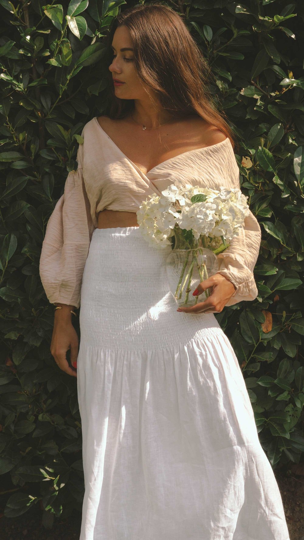 Easy Summer Outfit Idea. Sarah Butler of @sarahchristine wearing Wrap Crop Blouse and White Smocked Midi Skirt in Seattle, Washington - 13.jpg