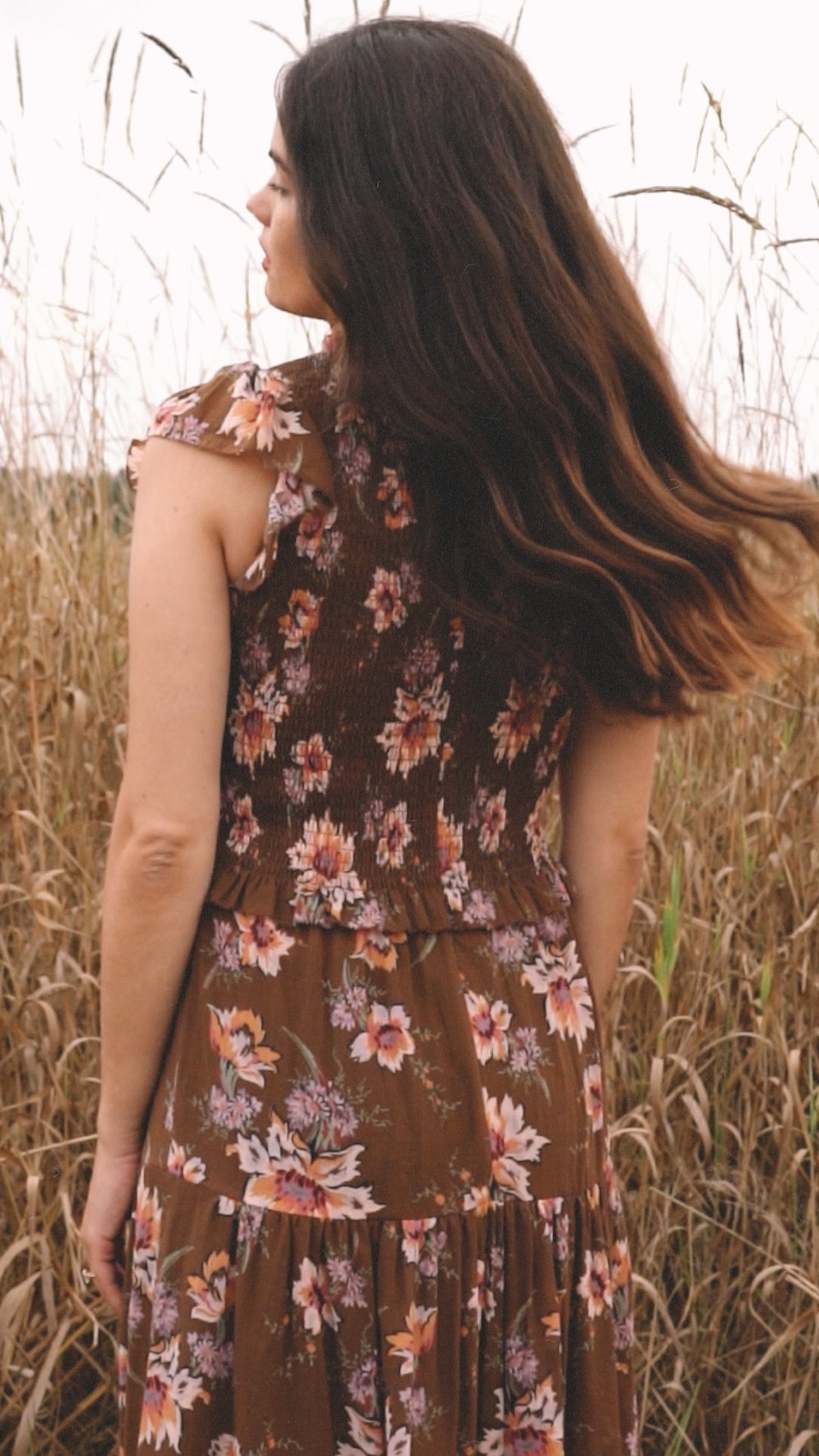 Sarah Butler of @sarahchristine wearing Brown Floral Fall Midi Dress in autumn field -3.jpg