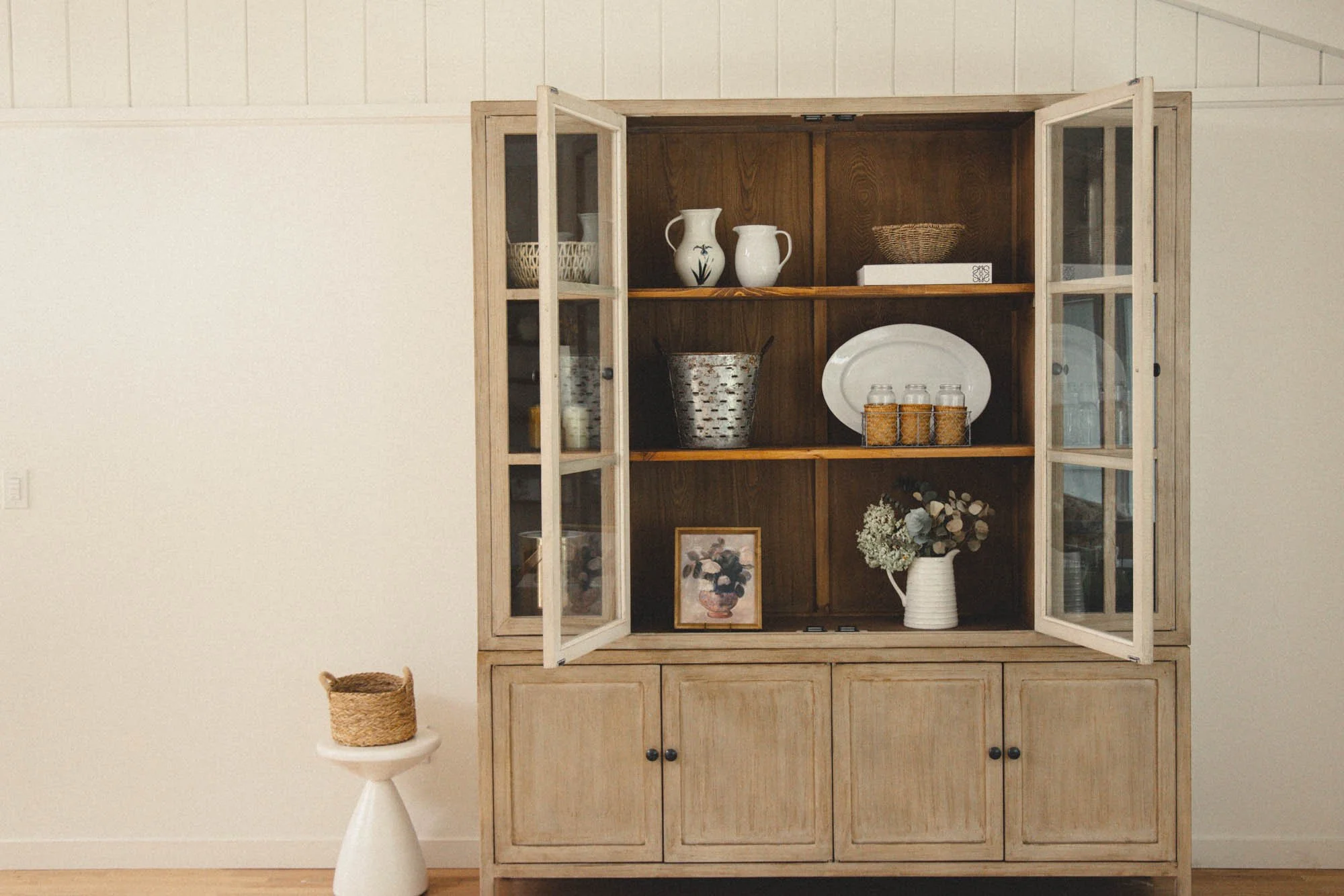 neutral spring shelf decor styled wood cabinet