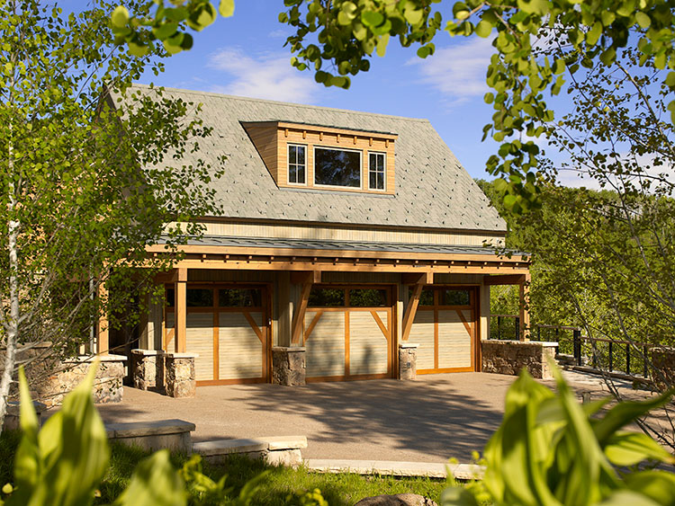  Additional Living space above this 3 car garage with custom garage doors to match perfectly to the homes siding 