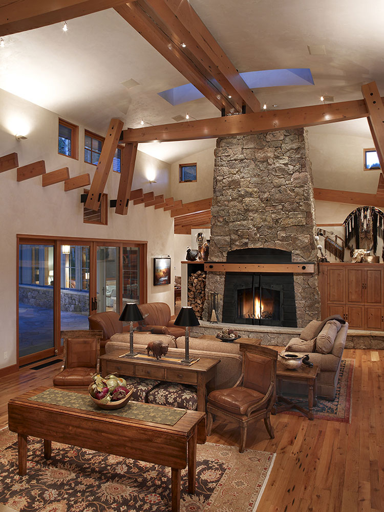  Massive stone fireplace serves as the center point of this grand great room  