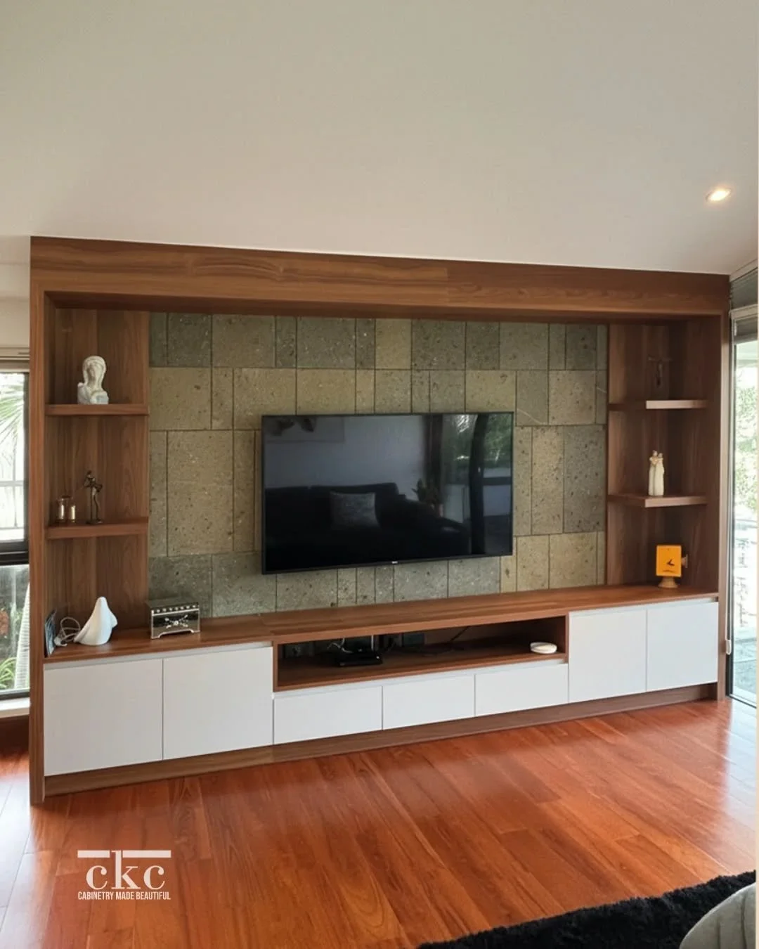 POV: You finally found a place to hide the ugly wires and display the pretty decor.

This custom entertainment unit proves you don&rsquo;t have to choose between storage and style. The lower custom cabinetry hides the consoles and cords, letting the 