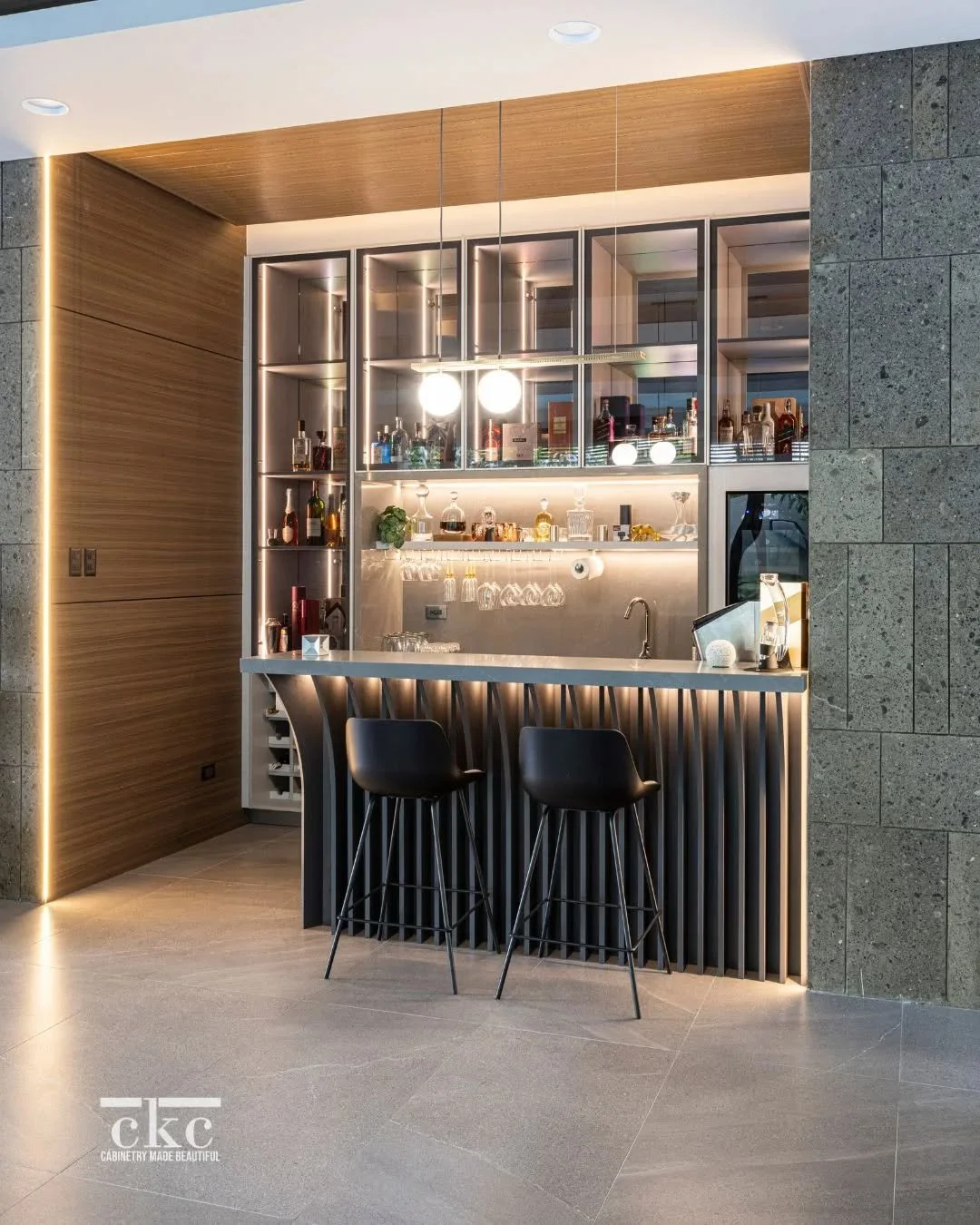 More than a home bar. It&rsquo;s a mood shift. 🍸

Why it works:

&bull; Soft lighting = instant calm
&bull; Warm wood = comfort
&bull; Texture = visual depth
&bull; Dedicated space = intentional ritual
&bull; Intimate scale = better conversations

D