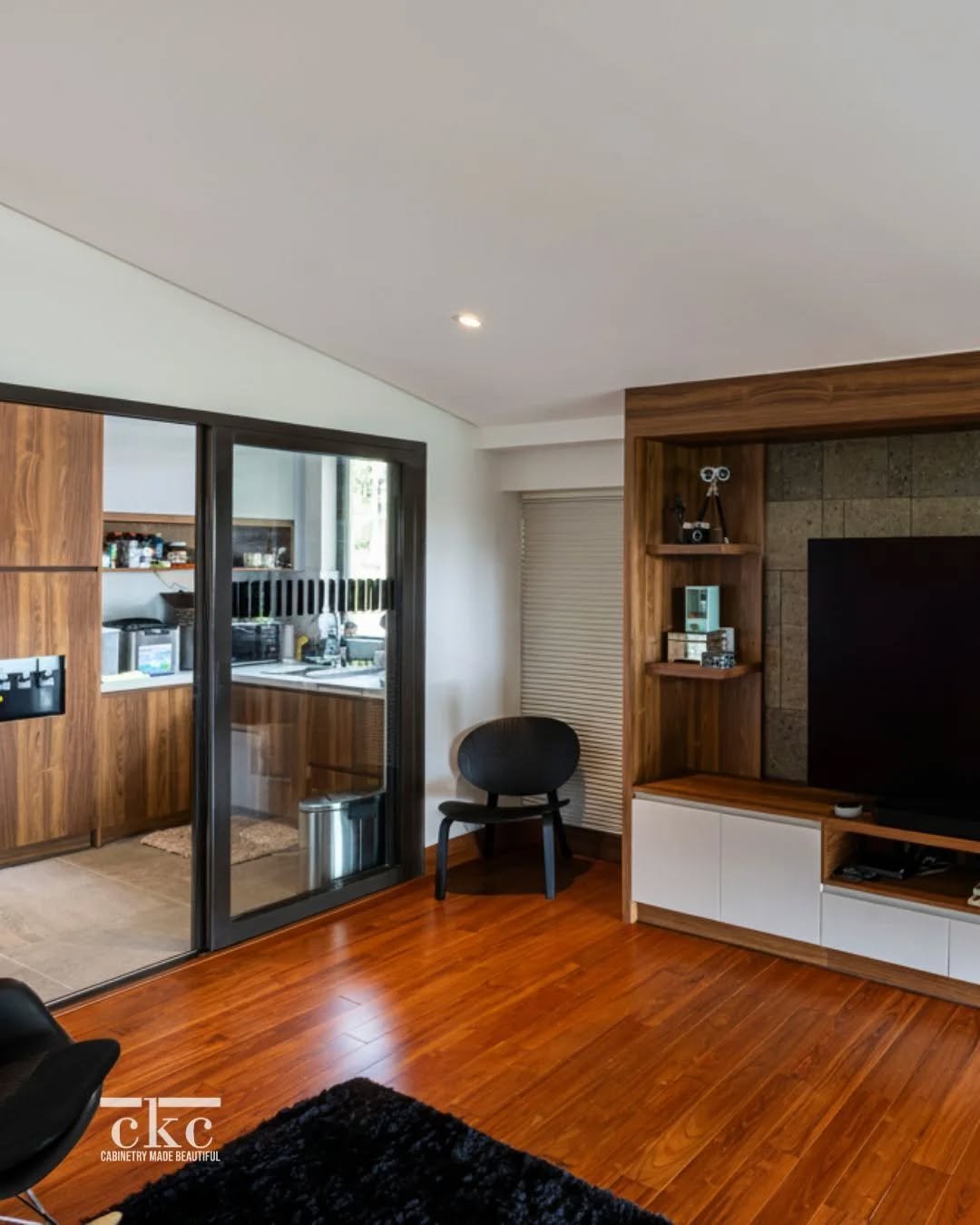 Refined condo living, thoughtfully designed.

A custom media console flows seamlessly into a clean, tailored kitchenette, where every detail serves a purpose.

Would this be your ideal space?✨