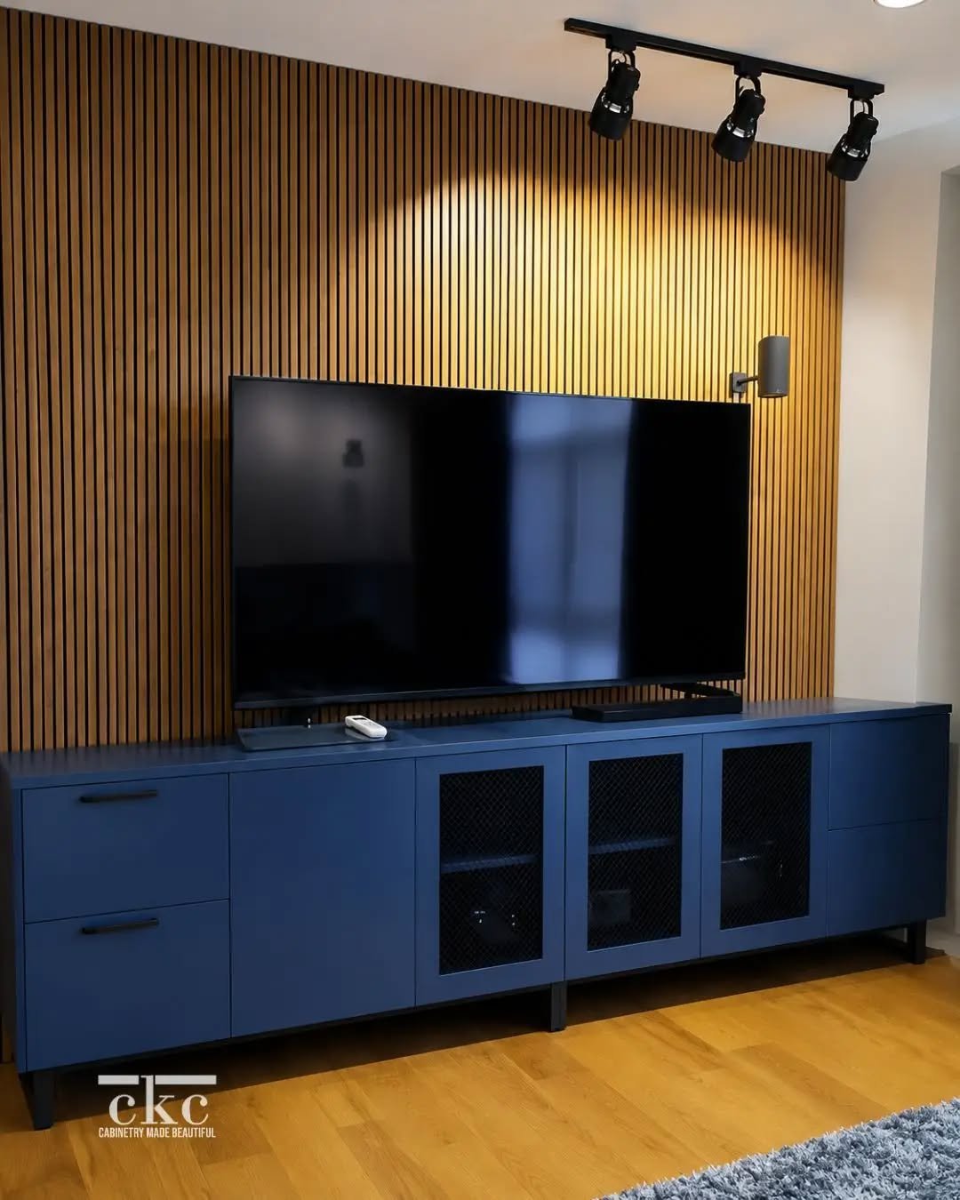 ✨ Great design is in the details.

With its rich navy finish, clean lines, and smart storage, this custom media console brings style and function into perfect balance.

Thinking about custom cabinetry for your home or business? Send us a message&mdas