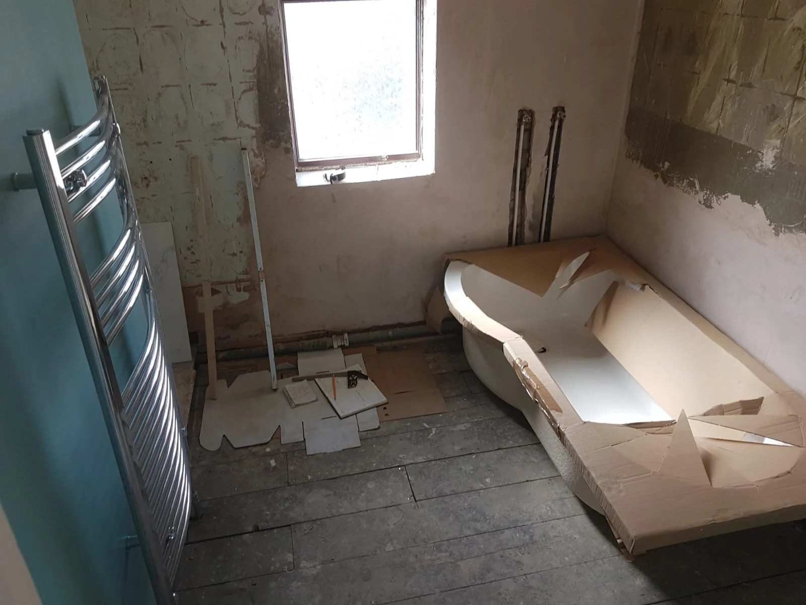The bathroom prior to flooring and tiling