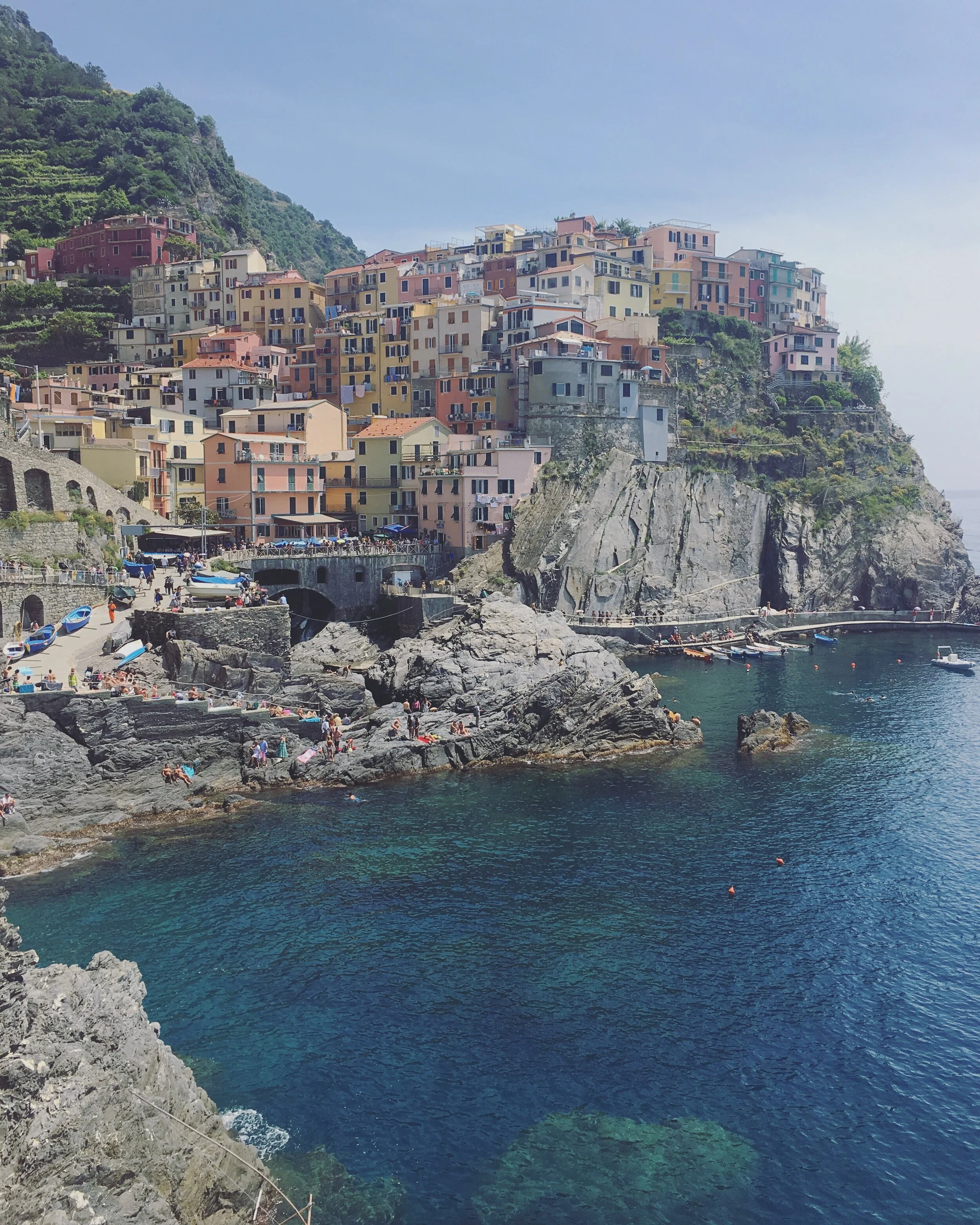 A short train ride (or hire a boat) to Cinque Terre