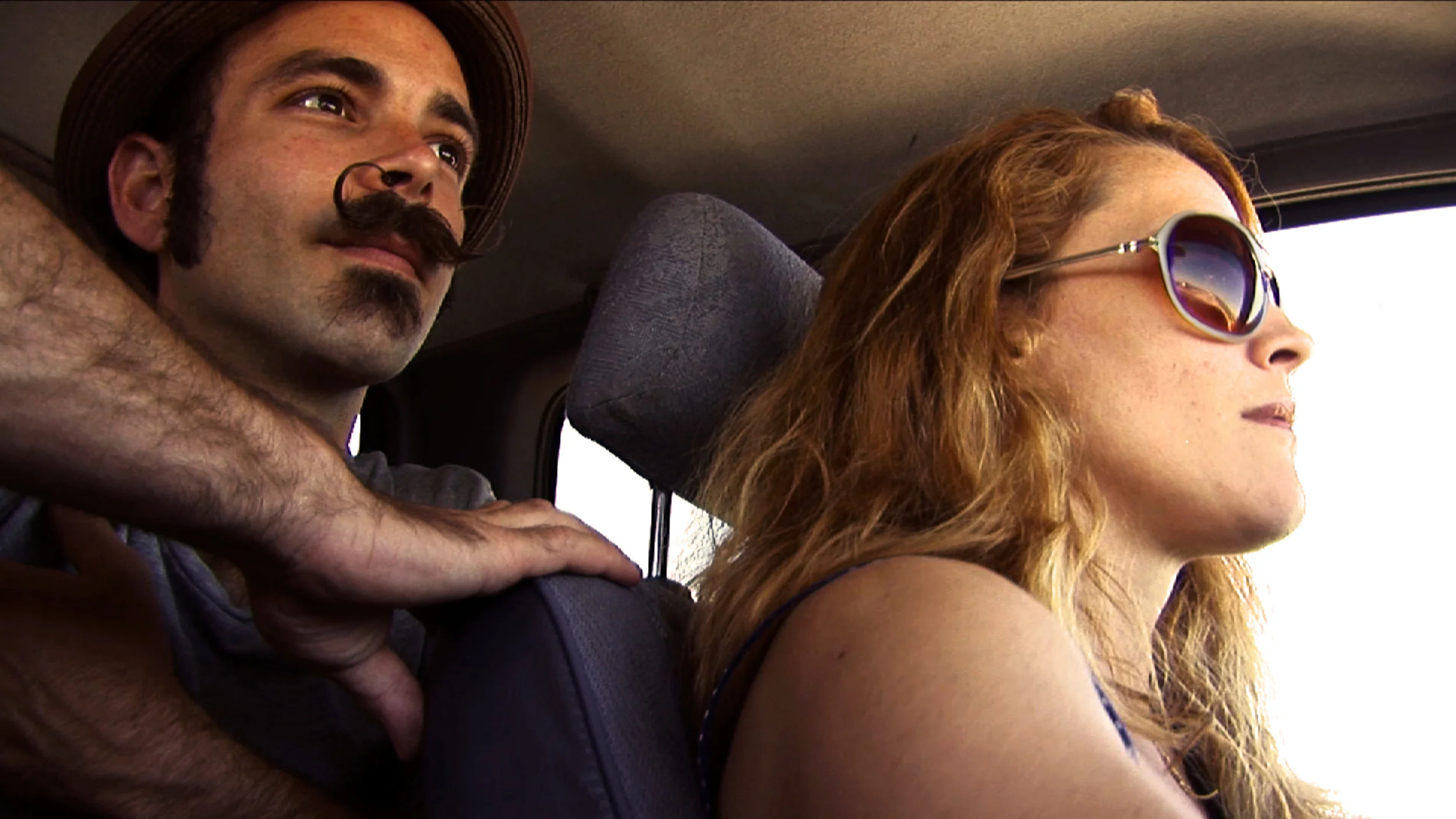 Trixie & Monkey driving home to Baltimore after a Southern tour, 2012, Film Still by Kirsten D'Andrea Hollander
