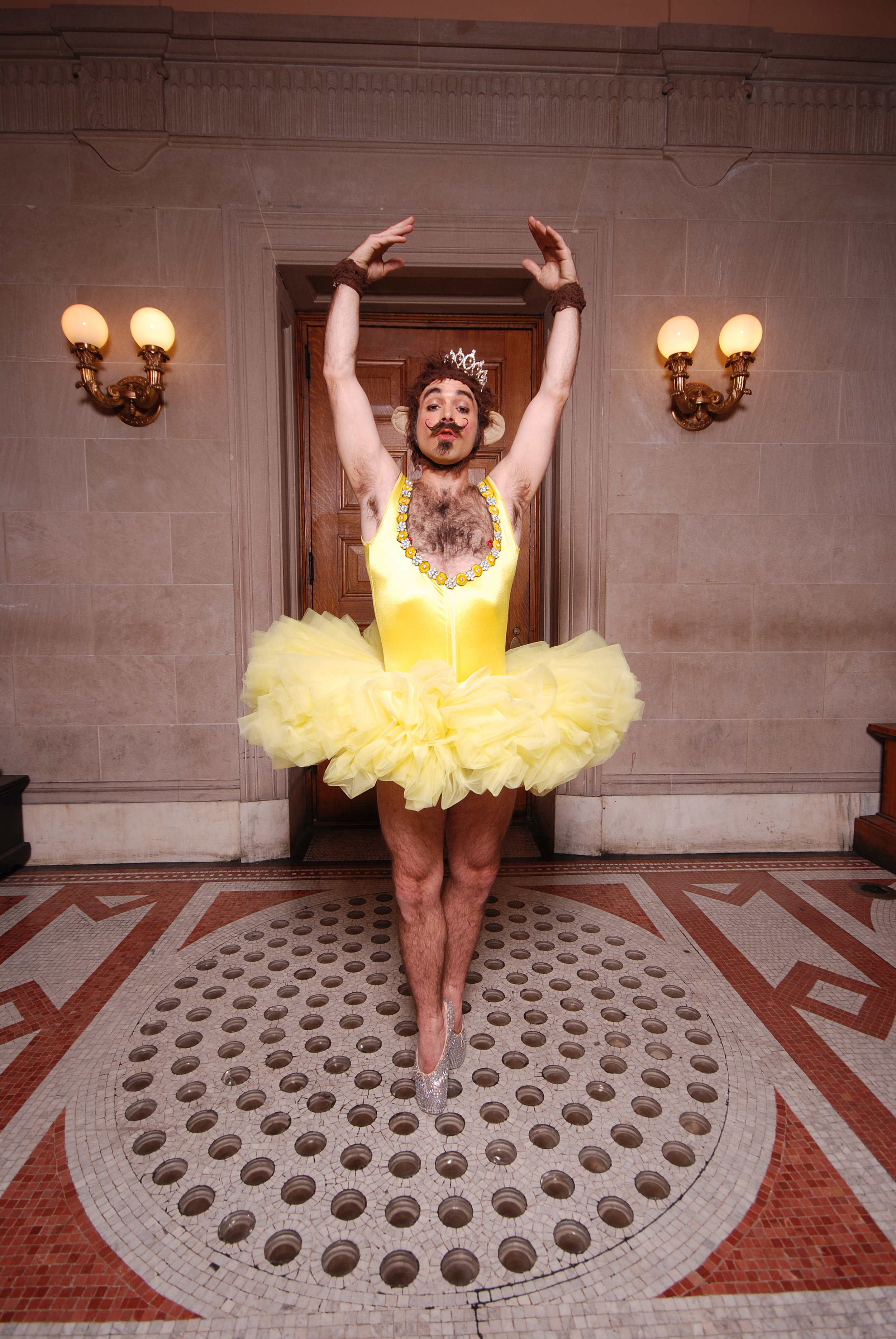 Monkey promoting his Prima Primate performance, MICA's Historic Main Building, Baltimore, Maryland, 2010, Photo by Mike Lee