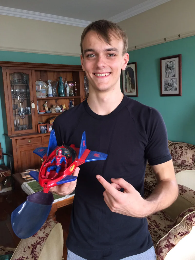 Adam Strom with his Spiderman toy, his reward from his parents for sticking with the circus.