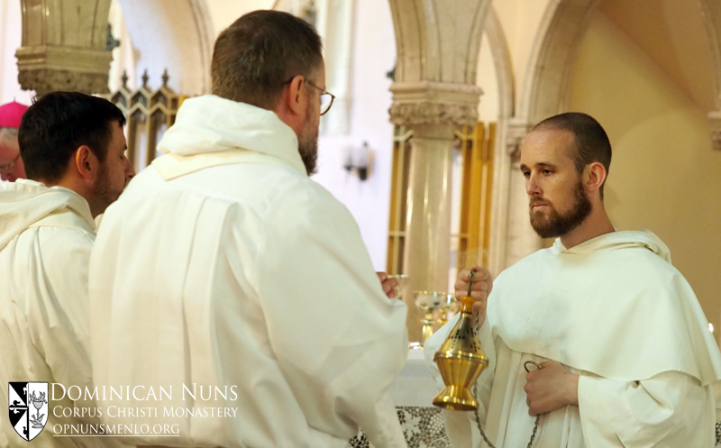 Brother Matthew Heynen, O.P. incenses the two concelebrants, Father Christopher Fadok, O.P. and Father Dennis Klein, O.P.