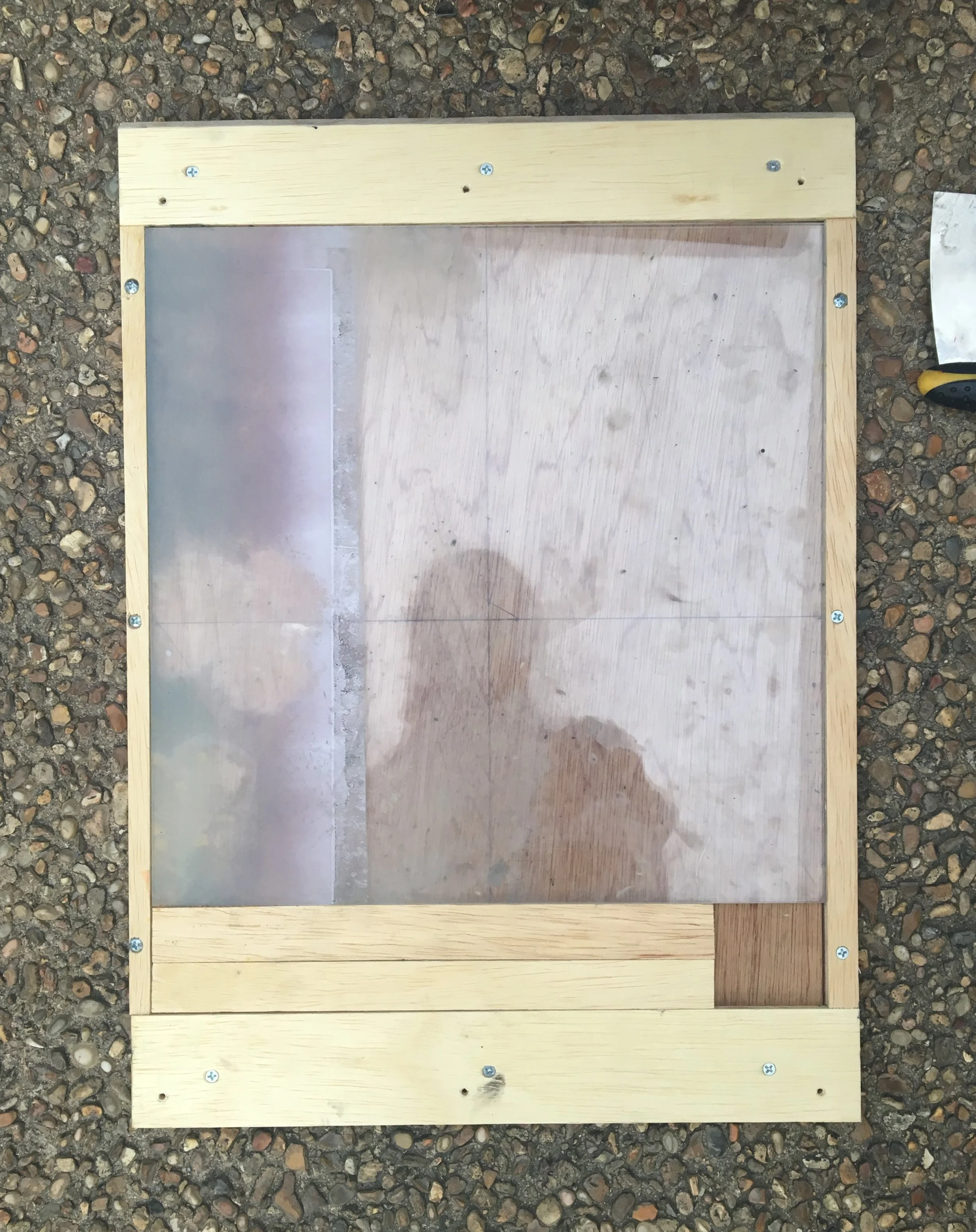  I designed a jig to hold my plates in place; the front lip is sloped so that the whole jig doesn’t shift when I run over it and the plates were locked in with bits of furniture similar to letterpress printing.  