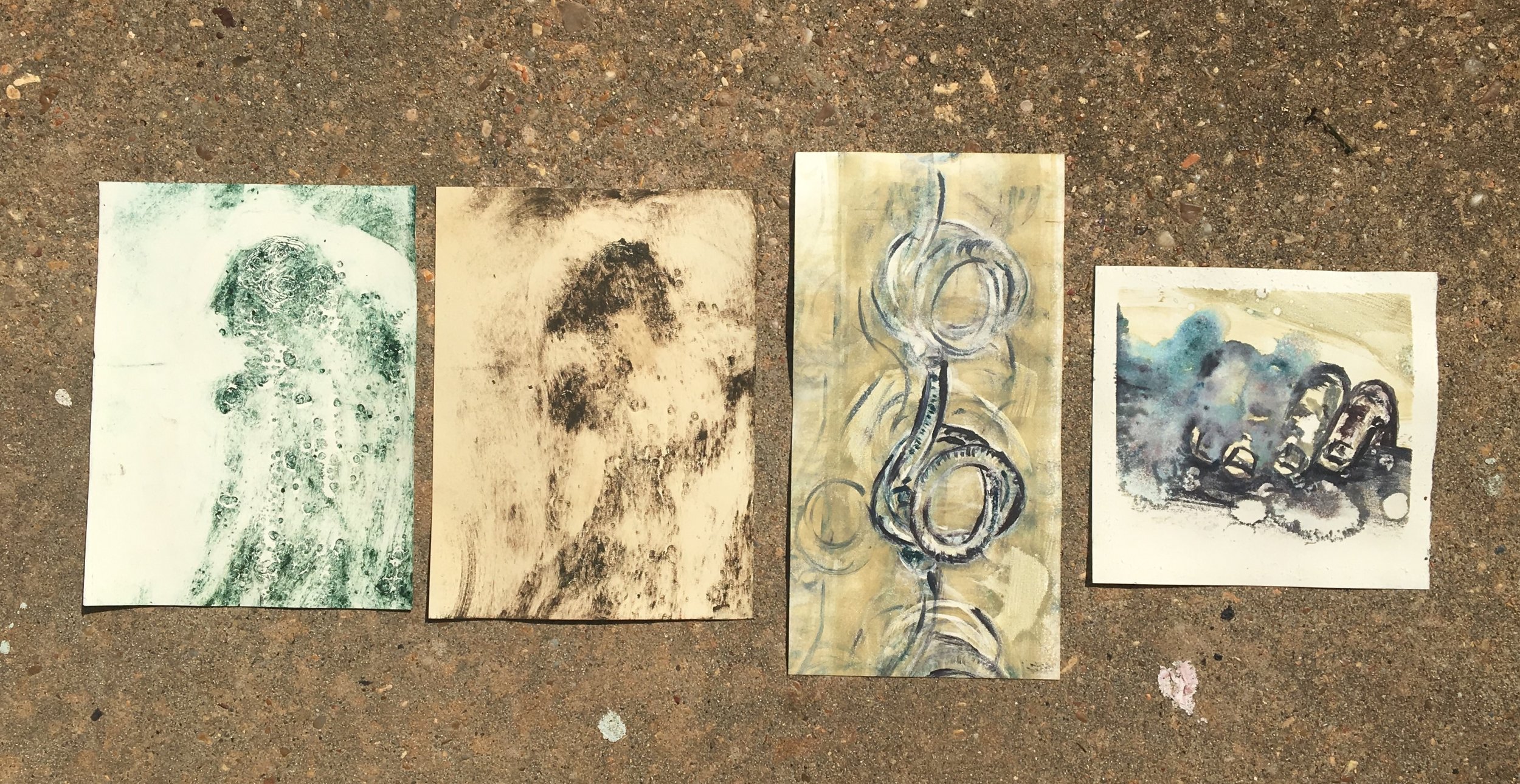The prints to the left are collagraphs and the ones on the right are monotypes. The collagraph to the far left is an example of more prominent tire marks. I eventually stopped doing collagraphs with the car because in order to get the kind of pressure they required I had to either print really damp or use very few blankets, which both result in tire marks.