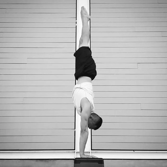 Self-critique: I didn't really stretch out my shoulders before doing drills, so you can see that there is a slight angle in my arms. My feet are lining up with the middle of my hands, which is great for balancing, but doesn't produce the straightest 